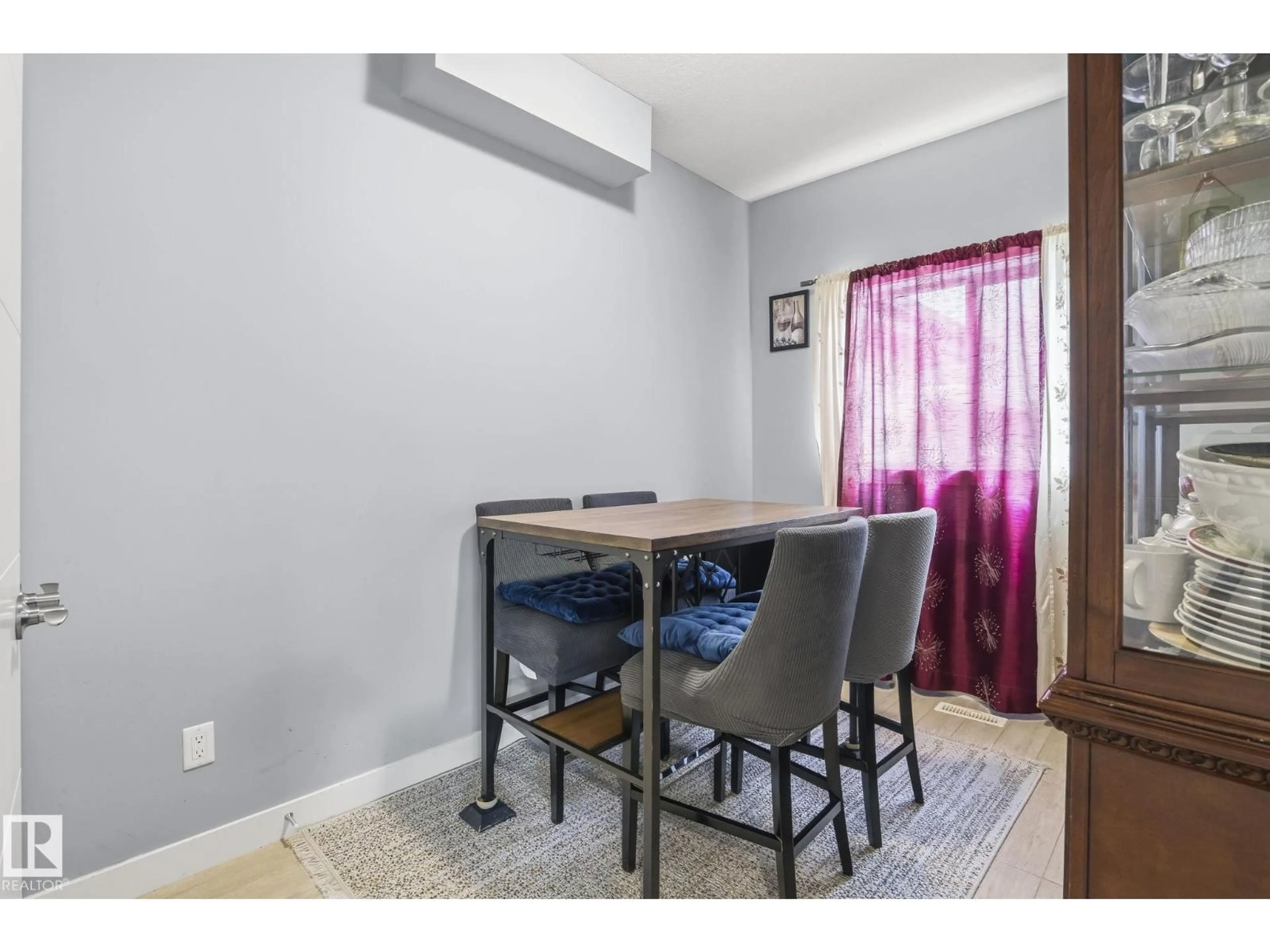 Dining room, wood/laminate floor for 3808 TRIOMPHE BV, Beaumont Alberta T4X0C4