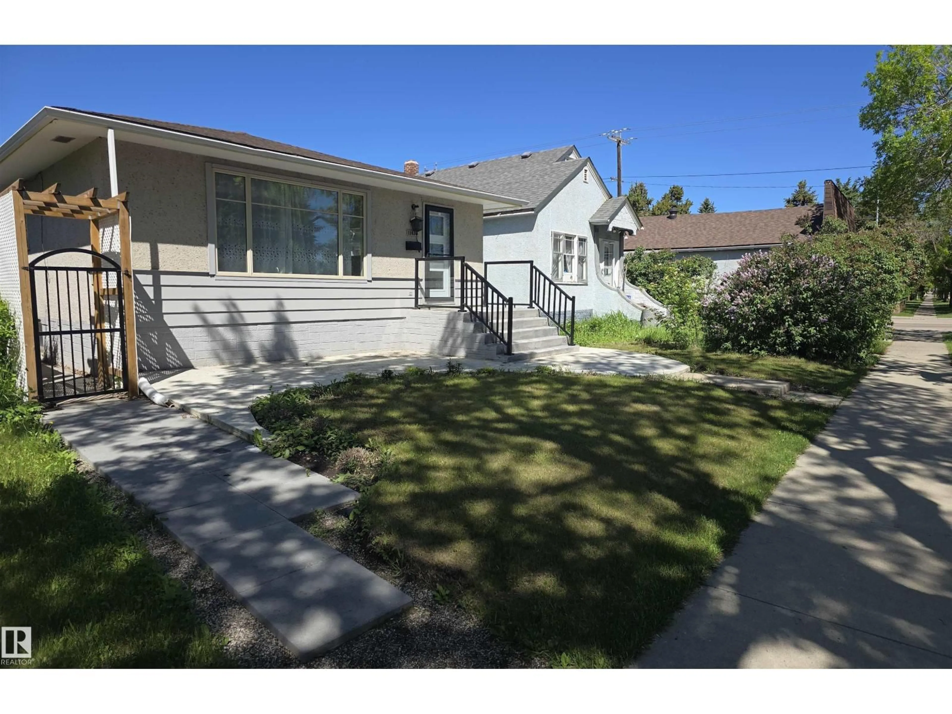 A pic from outside/outdoor area/front of a property/back of a property/a pic from drone, street for NW - 11430 81 ST, Edmonton Alberta T5B2R6