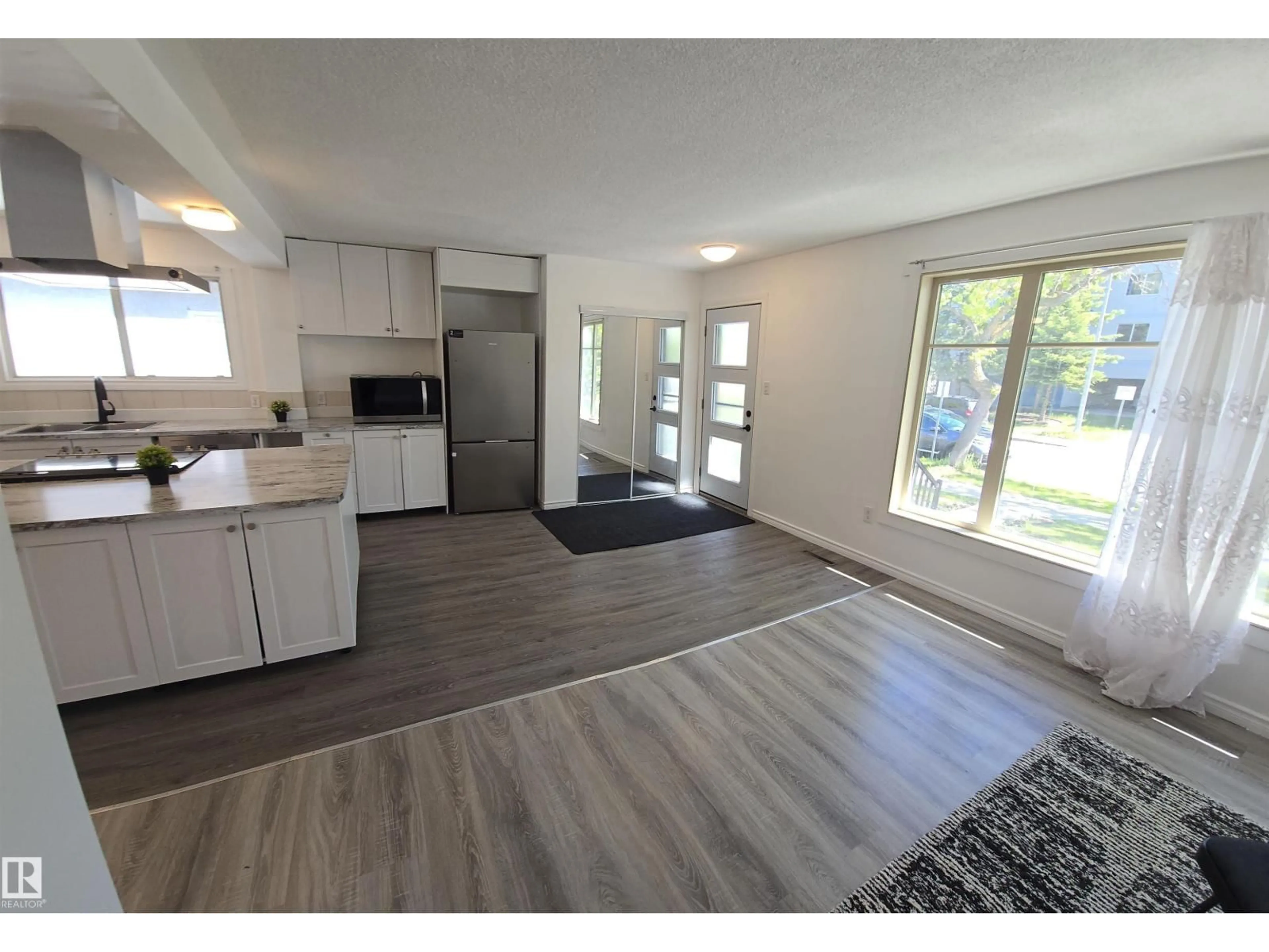 Open concept kitchen, unknown for NW - 11430 81 ST, Edmonton Alberta T5B2R6