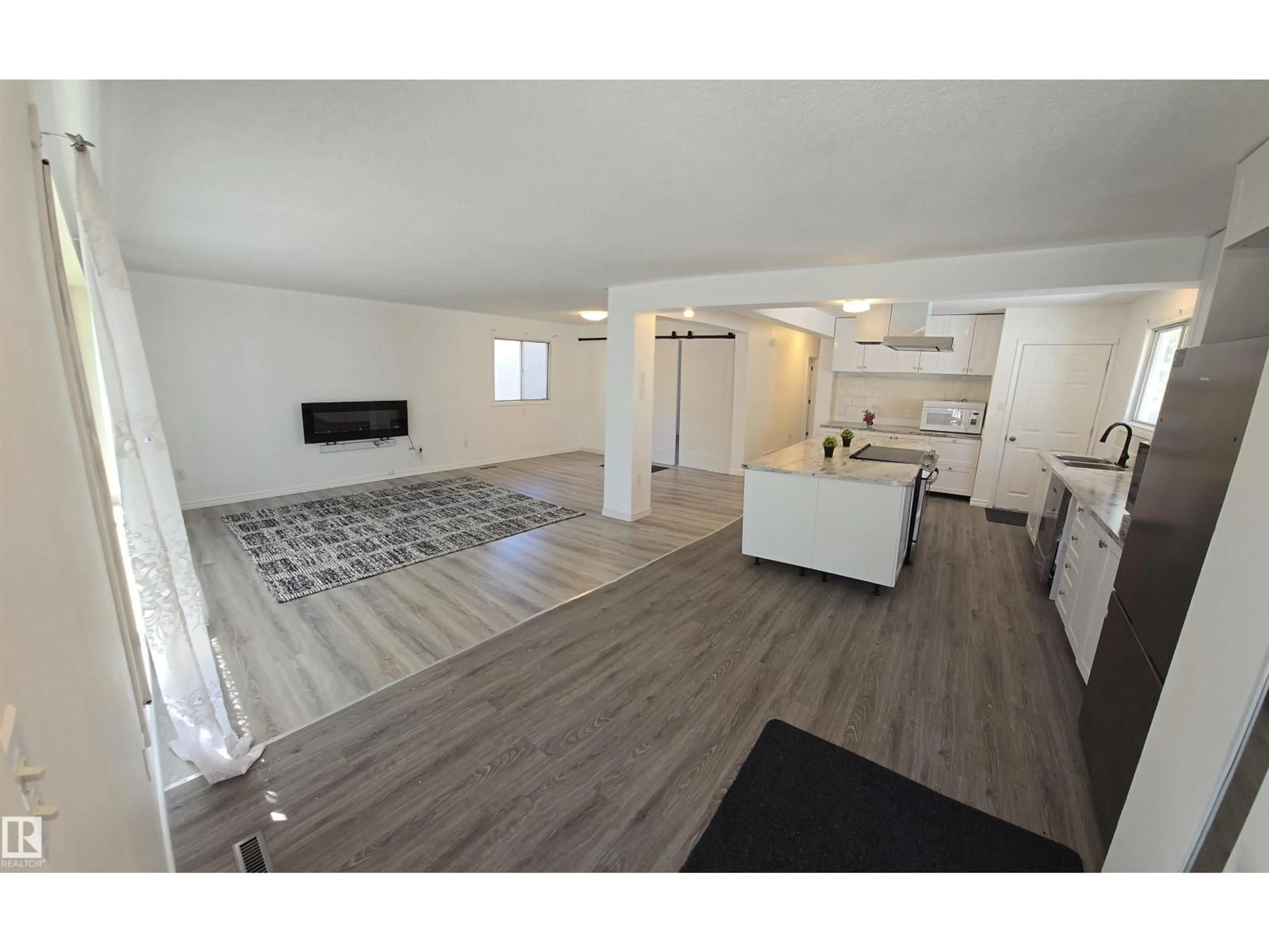 Open concept kitchen, unknown for NW - 11430 81 ST, Edmonton Alberta T5B2R6