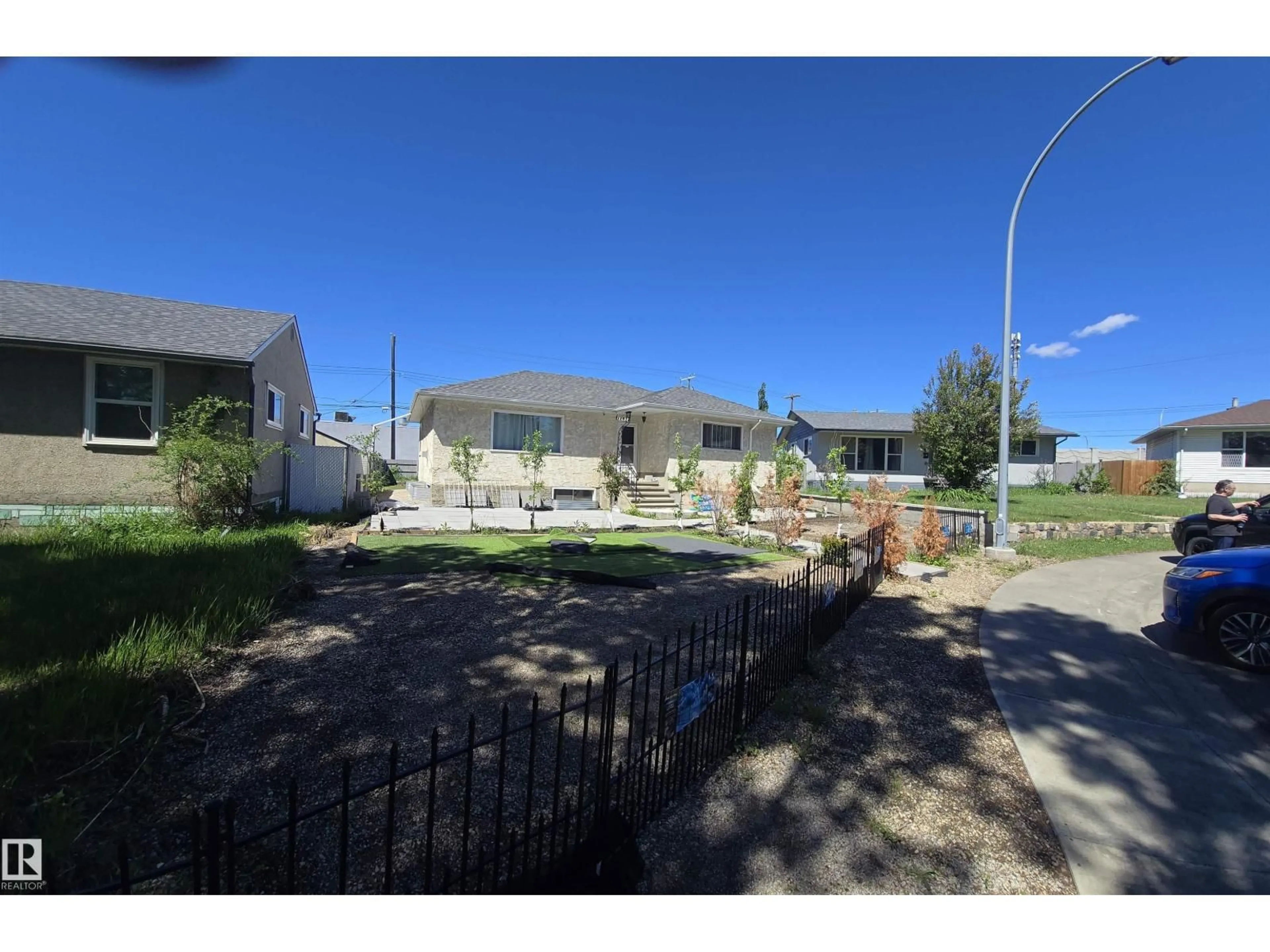 A pic from outside/outdoor area/front of a property/back of a property/a pic from drone, street for 12432 96 ST, Edmonton Alberta T5G1W7