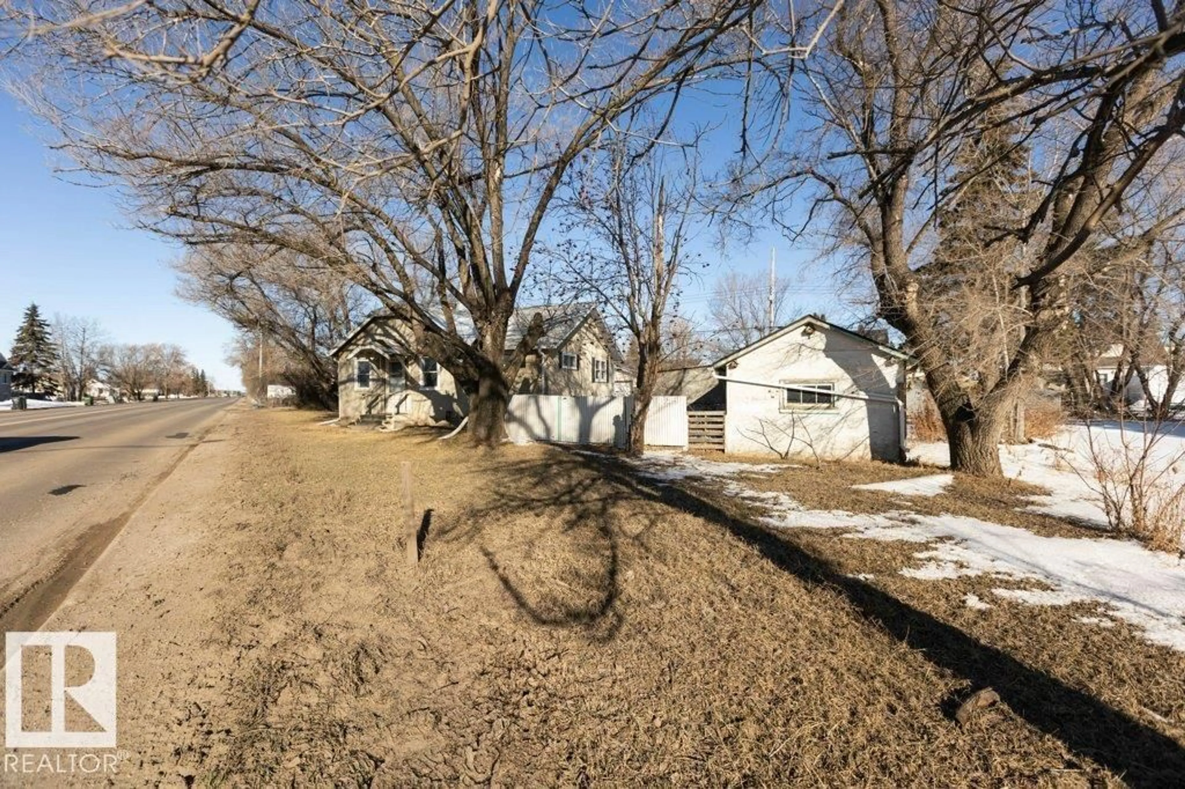 A pic from outside/outdoor area/front of a property/back of a property/a pic from drone, street for 9836 100 ST, Westlock Alberta T7P2R2