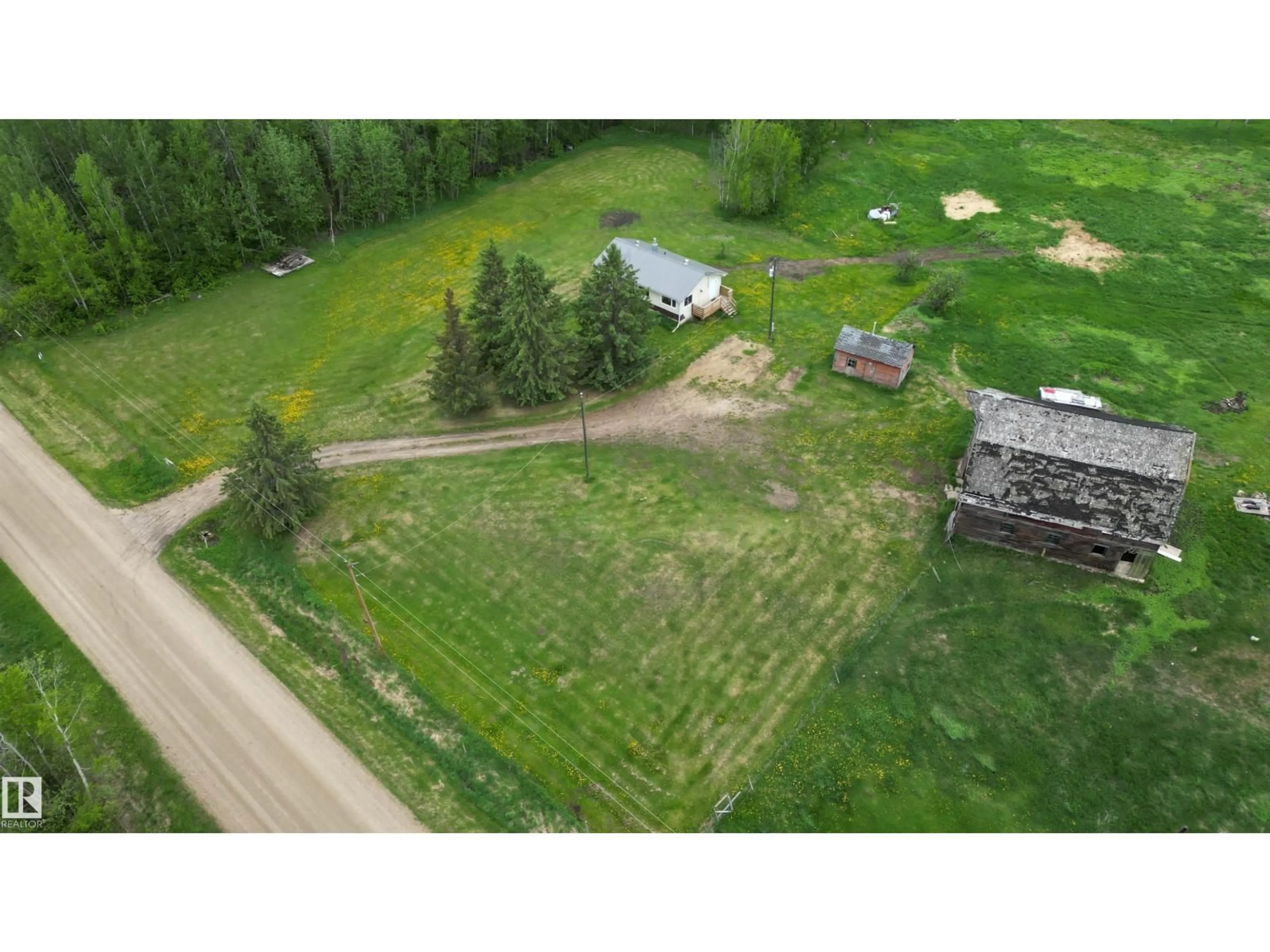 A pic from outside/outdoor area/front of a property/back of a property/a pic from drone, unknown for 4216 TWP RD 564, Rural Lac Ste. Anne County Alberta T0E1A0