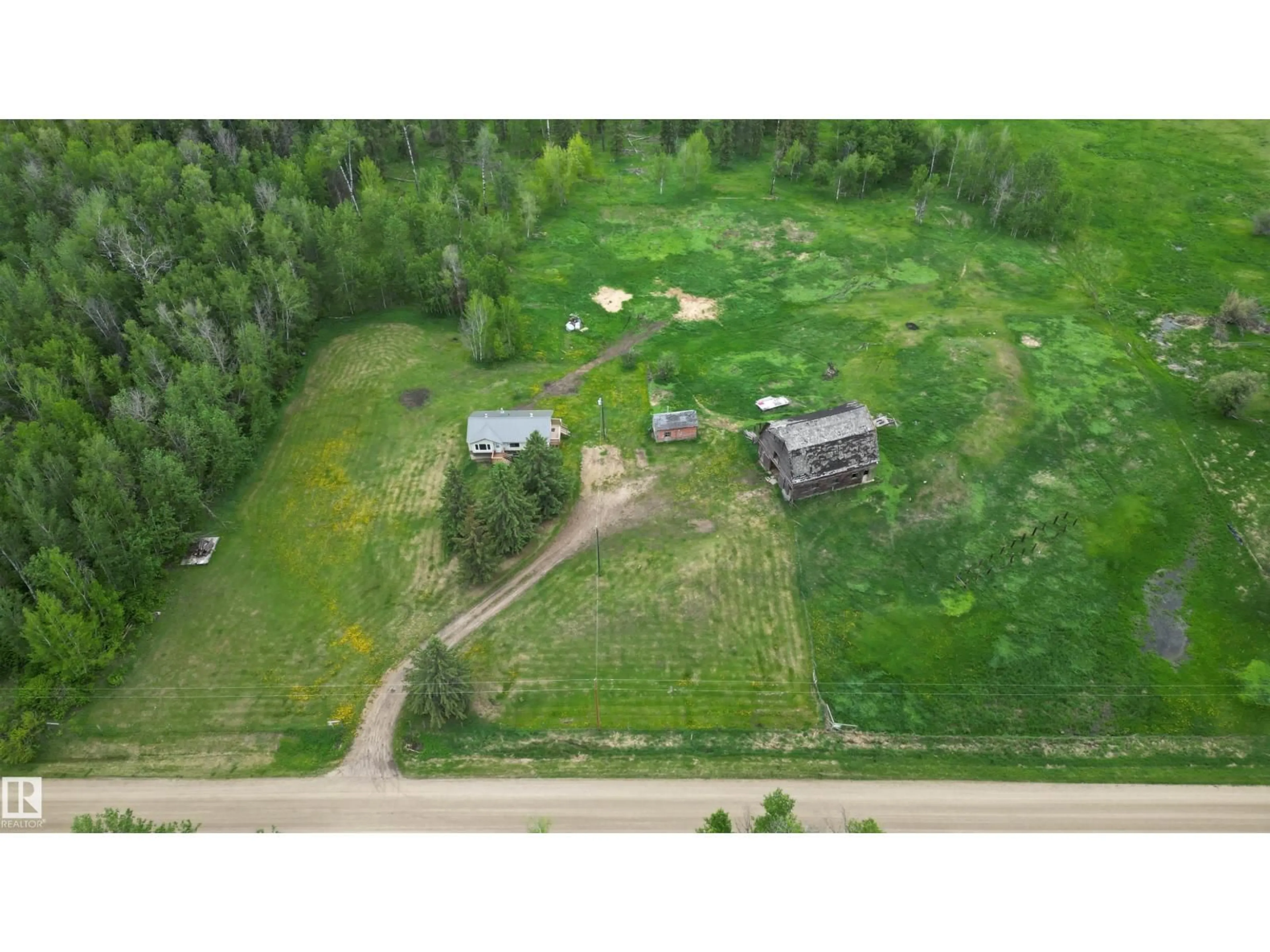 A pic from outside/outdoor area/front of a property/back of a property/a pic from drone, unknown for 4216 TWP RD 564, Rural Lac Ste. Anne County Alberta T0E1A0