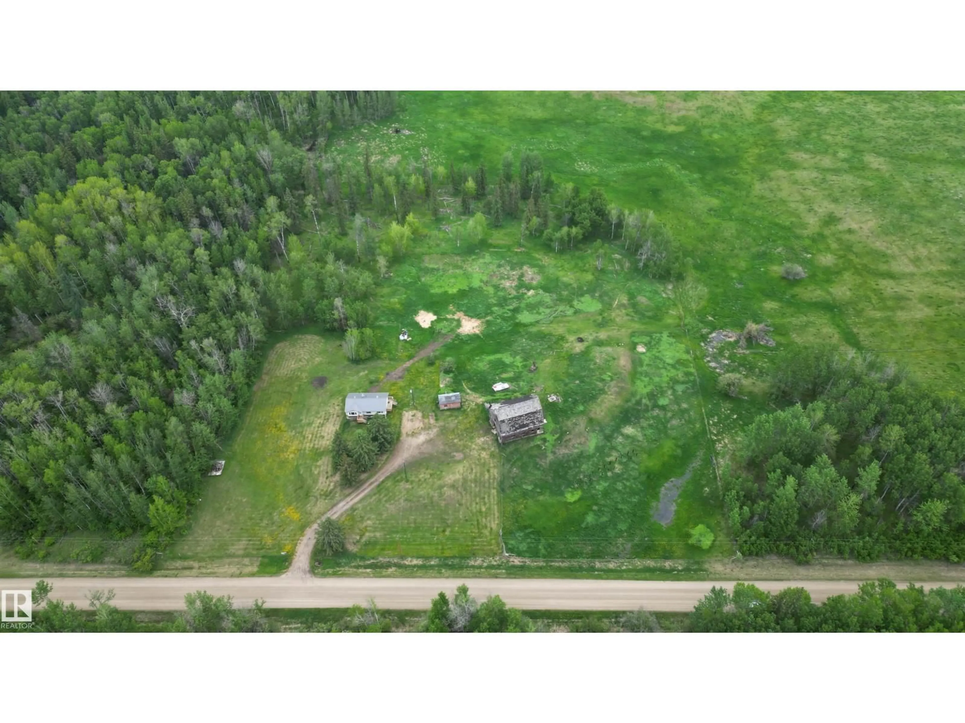 A pic from outside/outdoor area/front of a property/back of a property/a pic from drone, forest/trees view for 4216 TWP RD 564, Rural Lac Ste. Anne County Alberta T0E1A0