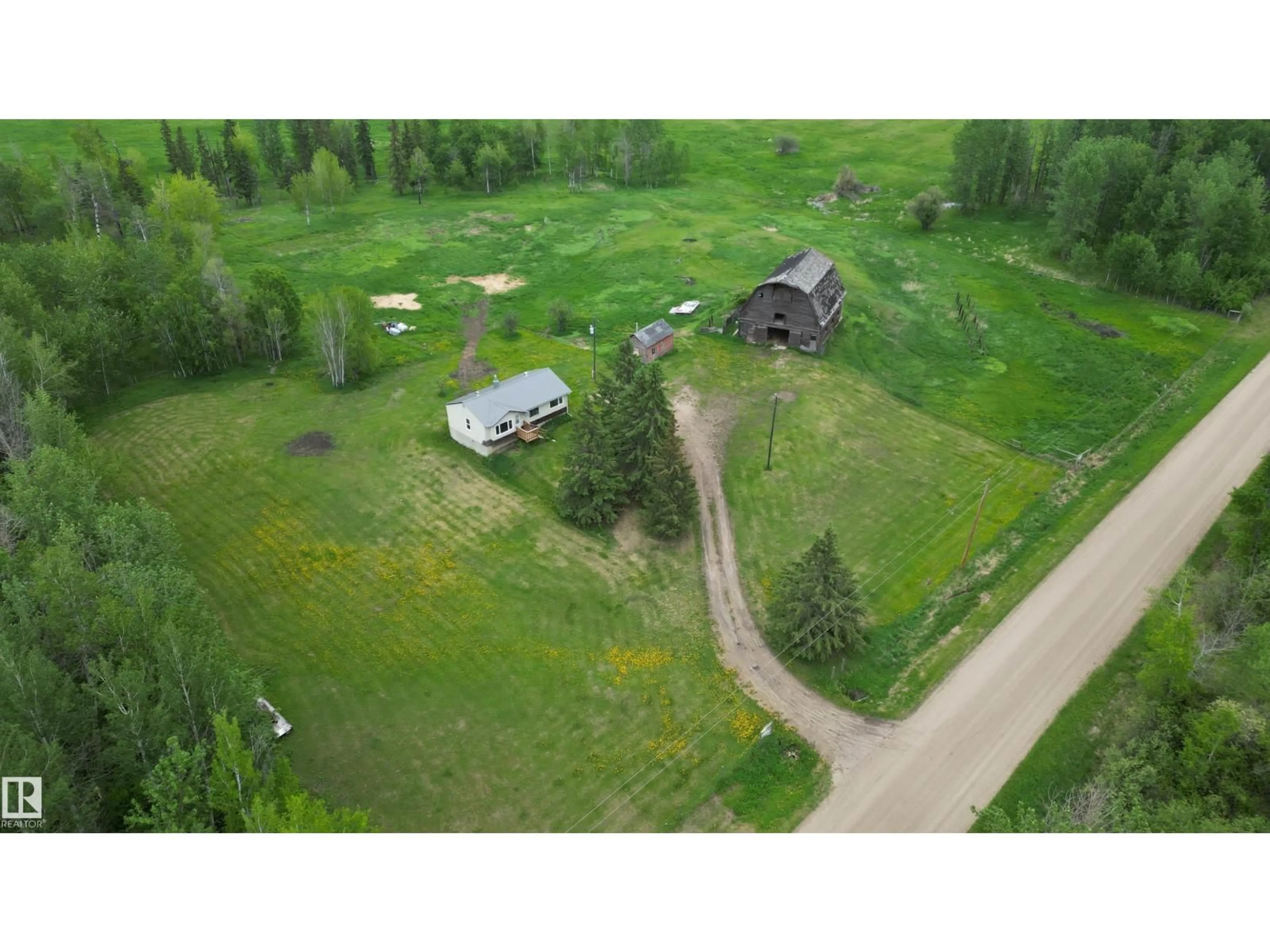 A pic from outside/outdoor area/front of a property/back of a property/a pic from drone, unknown for 4216 TWP RD 564, Rural Lac Ste. Anne County Alberta T0E1A0