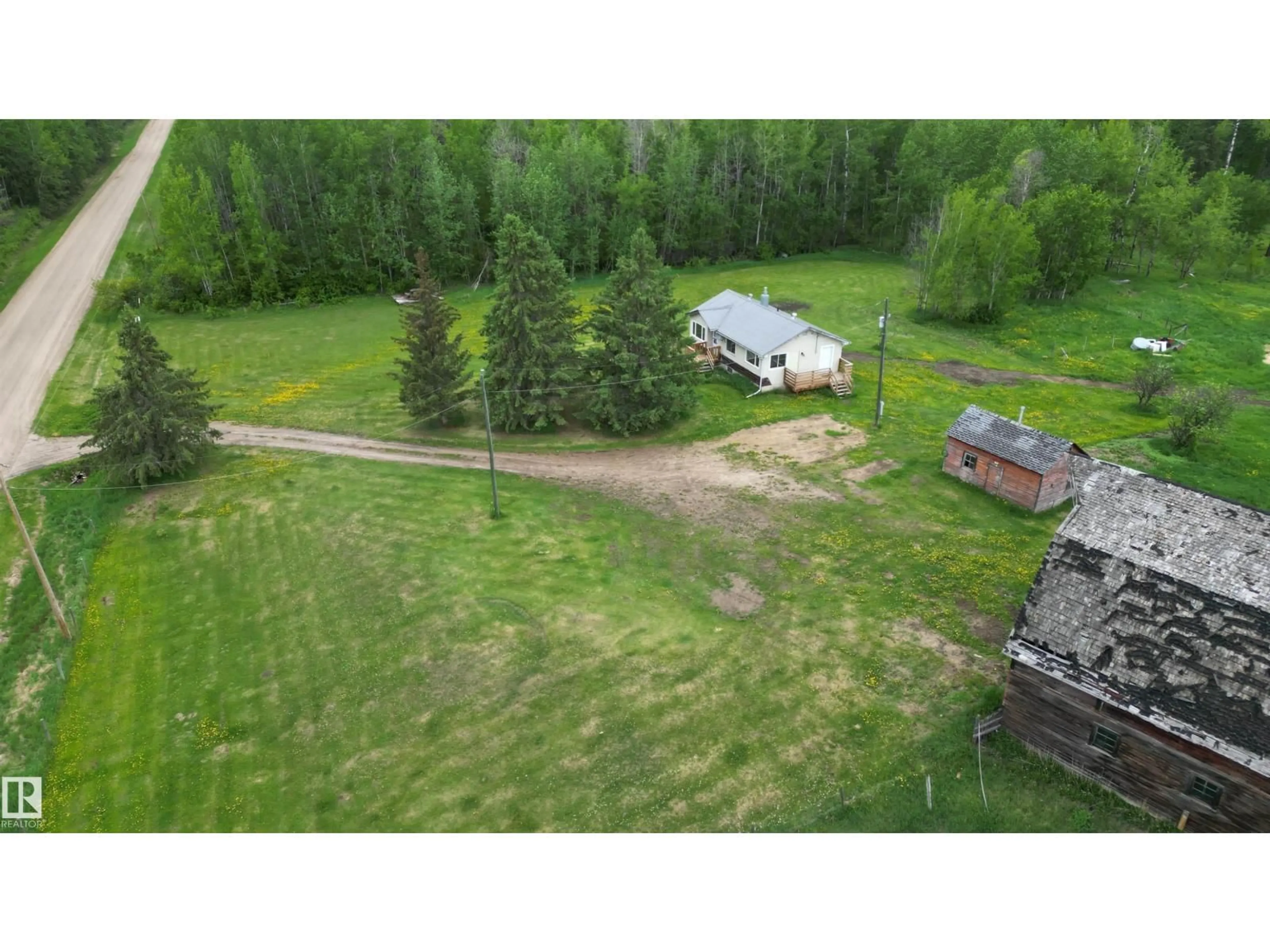 A pic from outside/outdoor area/front of a property/back of a property/a pic from drone, unknown for 4216 TWP RD 564, Rural Lac Ste. Anne County Alberta T0E1A0