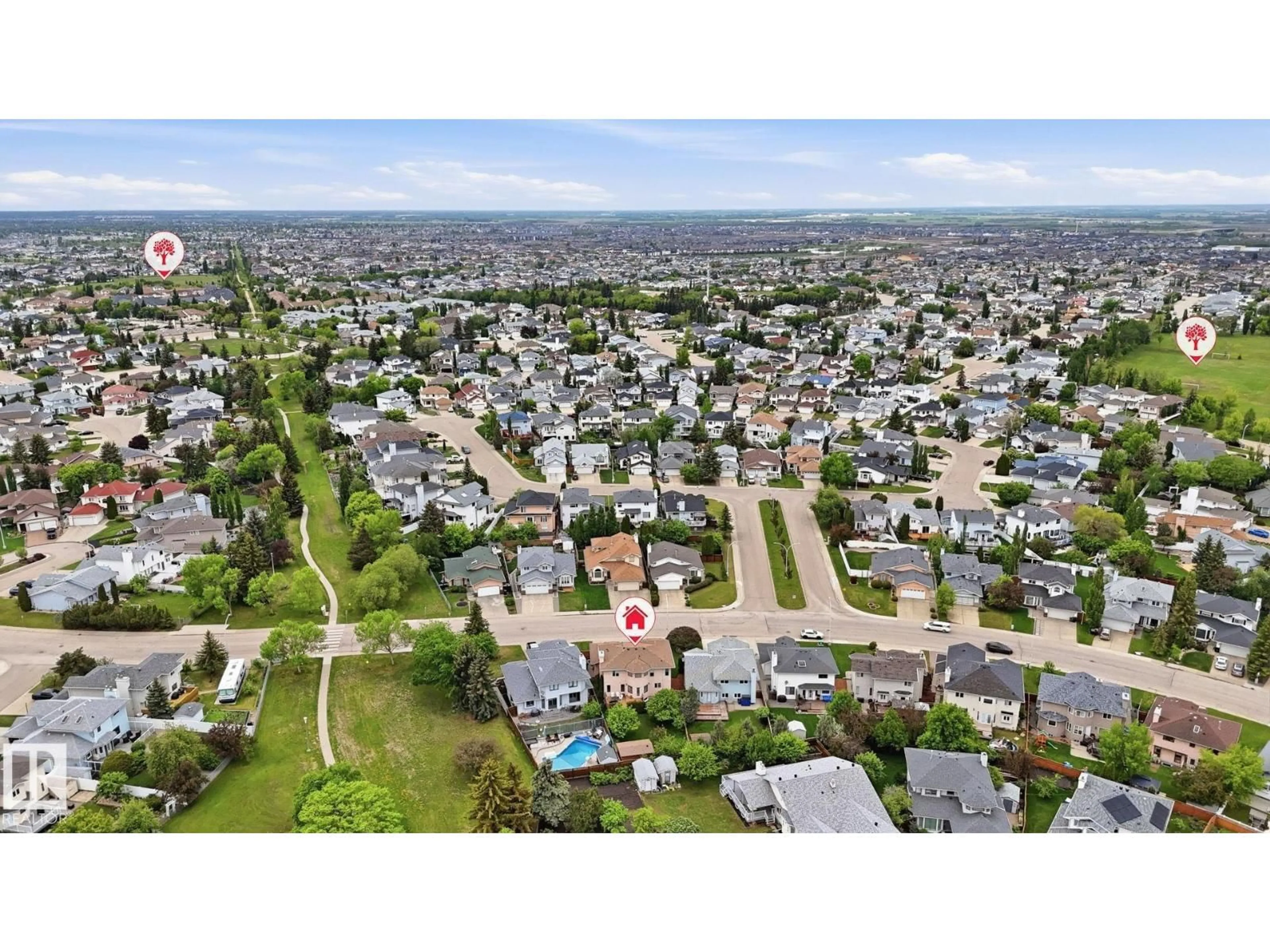 A pic from outside/outdoor area/front of a property/back of a property/a pic from drone, street for 6119 156 AV, Edmonton Alberta T5Y2N1