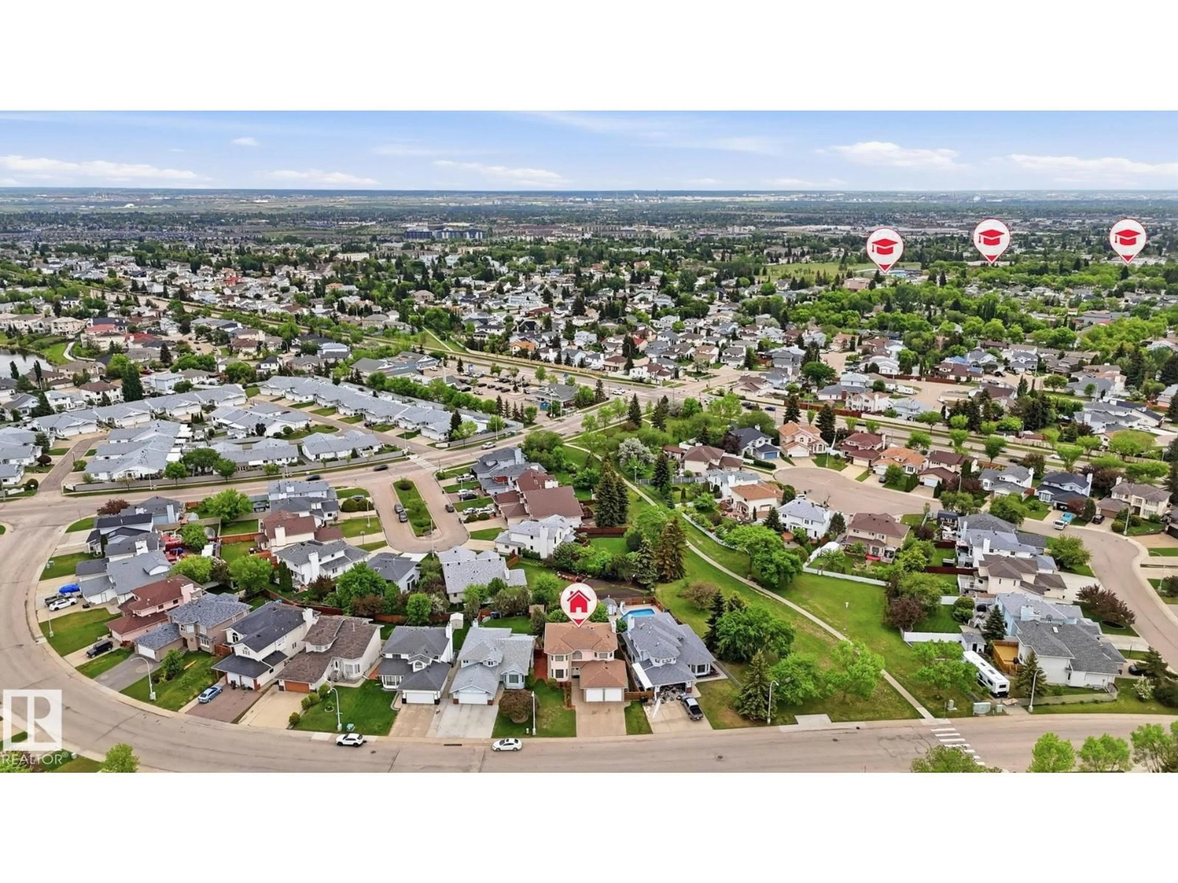 A pic from outside/outdoor area/front of a property/back of a property/a pic from drone, street for 6119 156 AV, Edmonton Alberta T5Y2N1