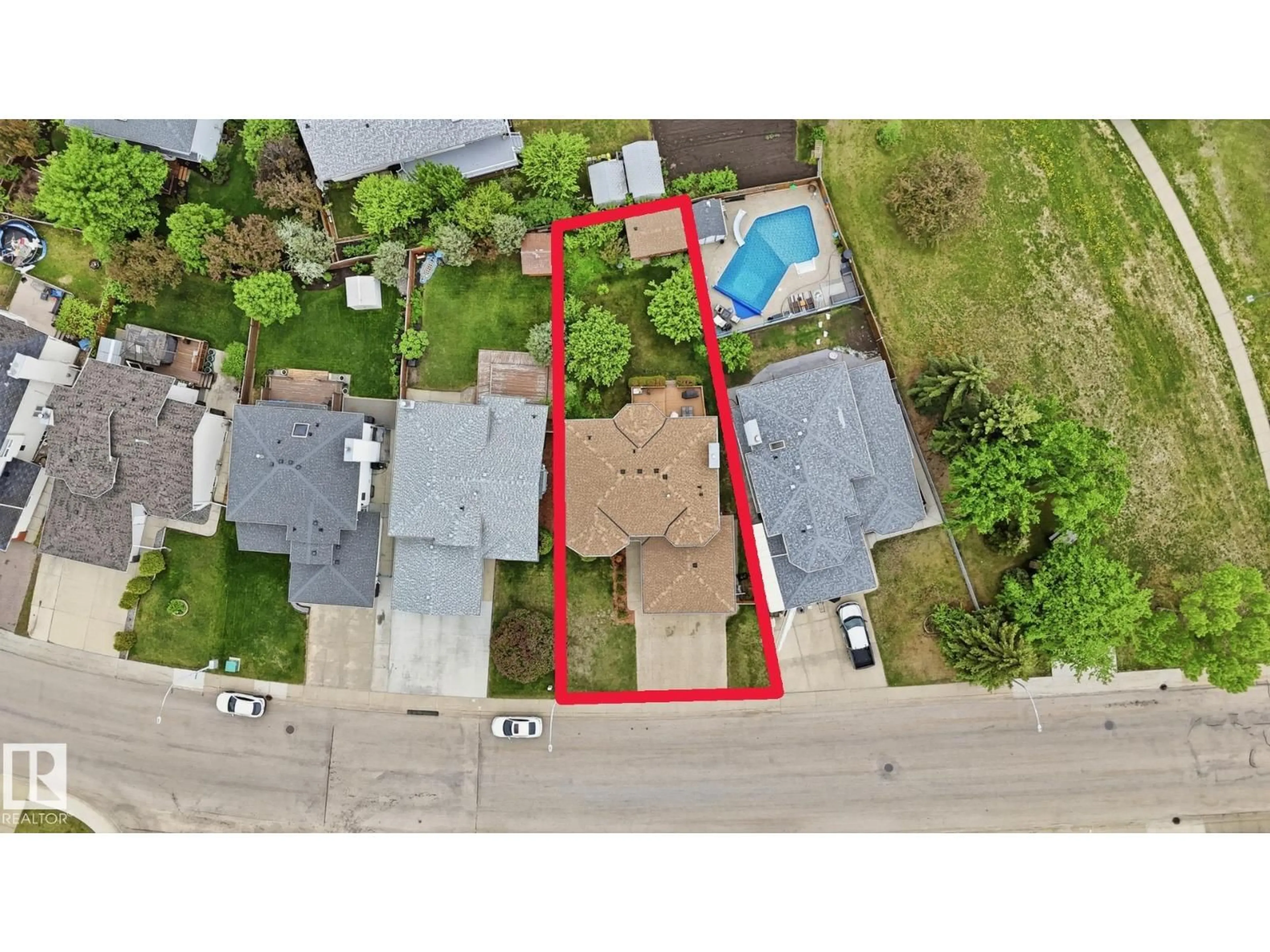 A pic from outside/outdoor area/front of a property/back of a property/a pic from drone, street for 6119 156 AV, Edmonton Alberta T5Y2N1
