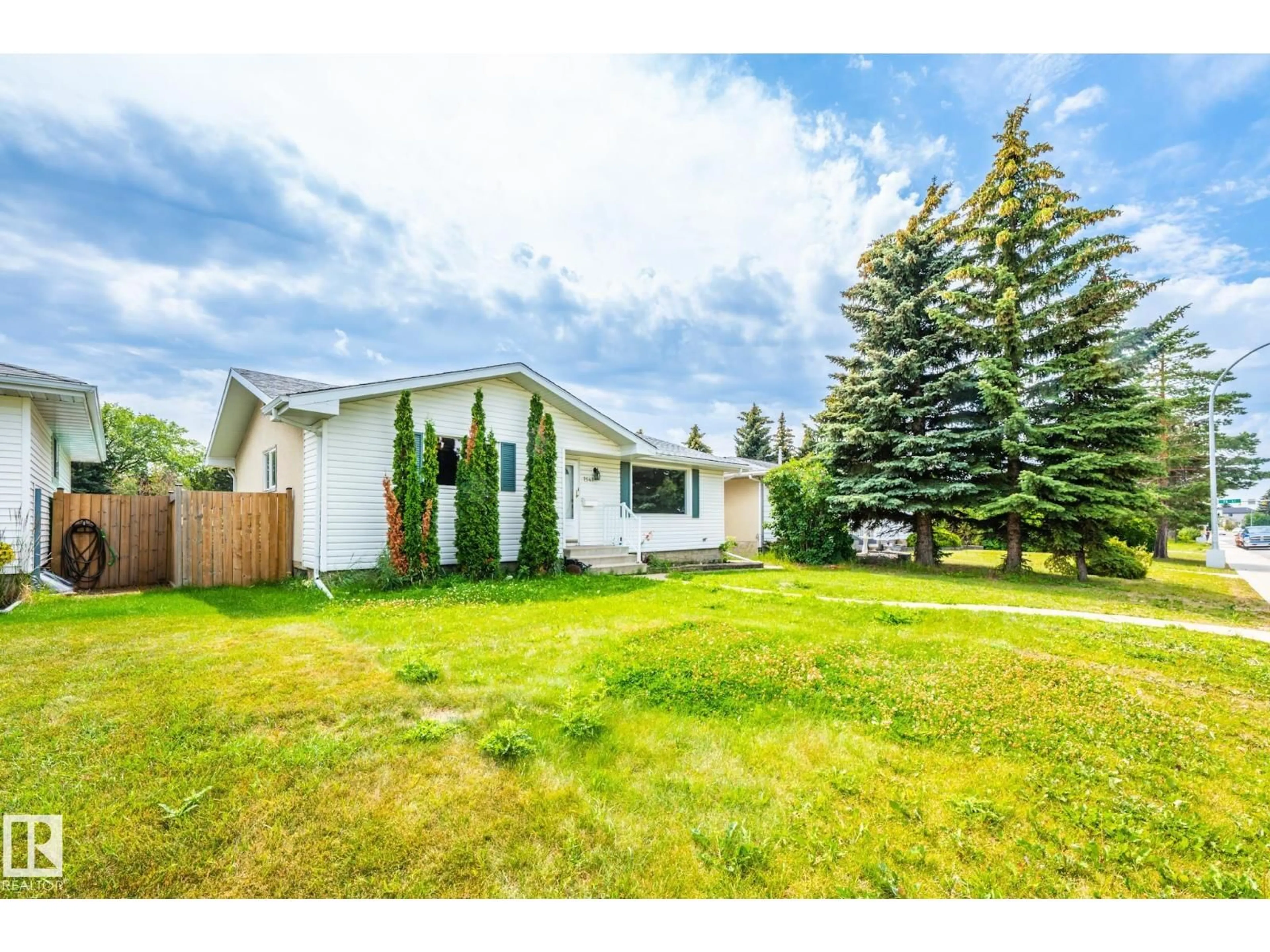 A pic from outside/outdoor area/front of a property/back of a property/a pic from drone, street for 7543 149A AV, Edmonton Alberta T5C2W8