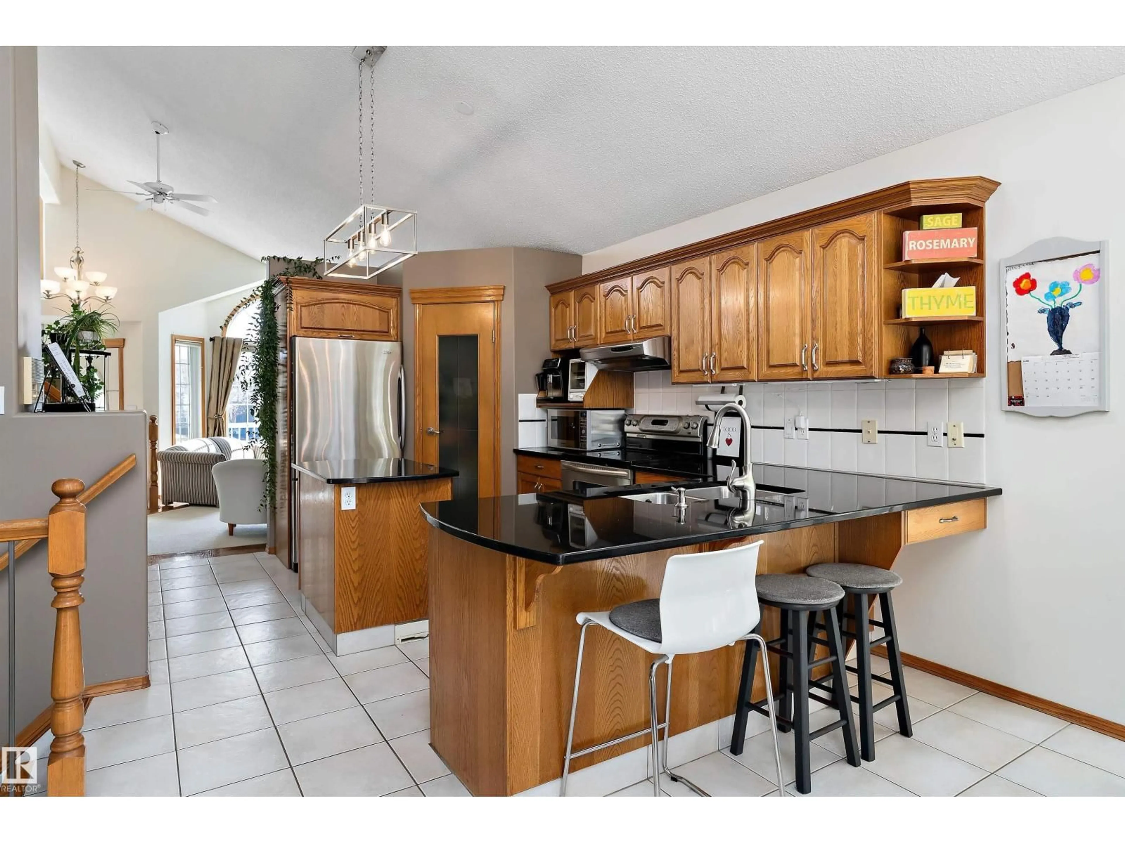 Open concept kitchen, ceramic/tile floor for 11328 173 AV, Edmonton Alberta T5X5Y4