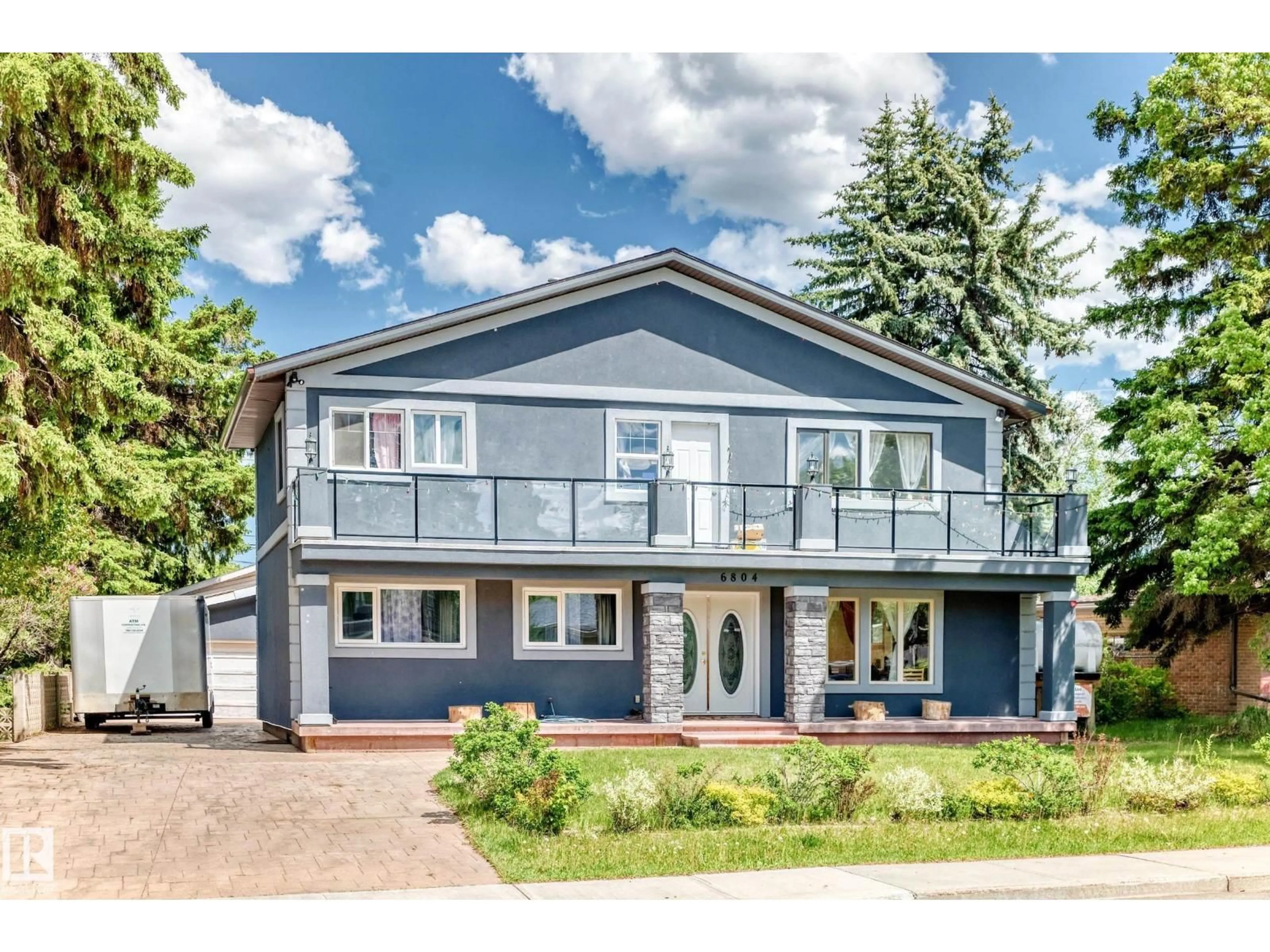 Home with vinyl exterior material, street for 6804 102A AV, Edmonton Alberta T6A0R9