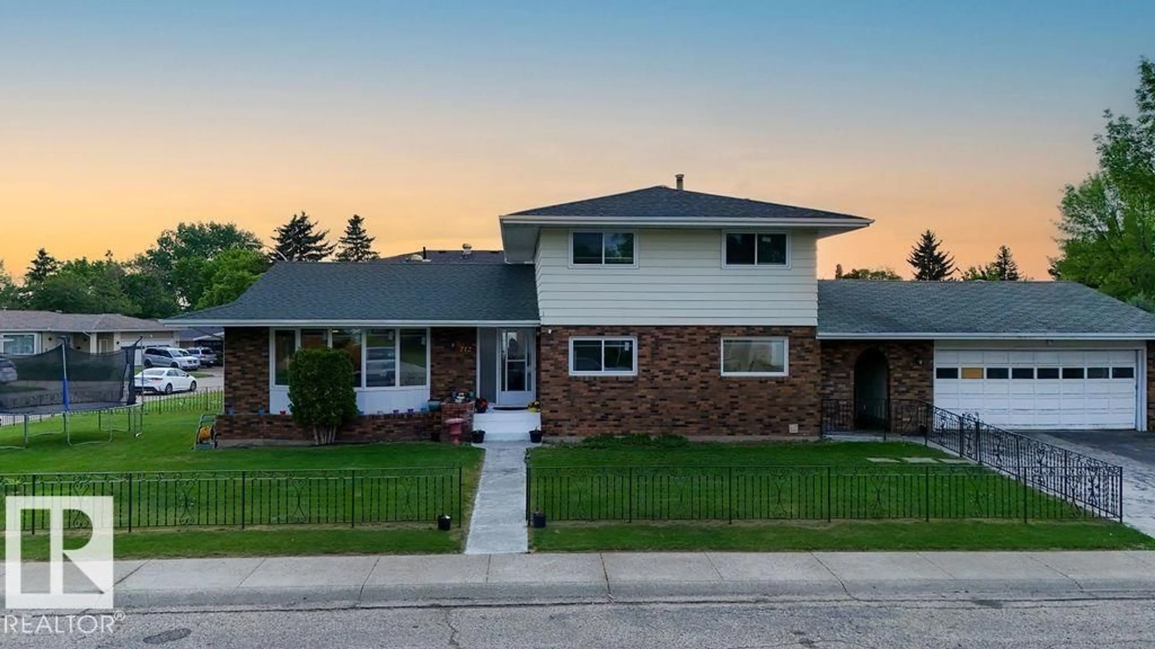 Home with brick exterior material, street for 712 LEE RIDGE RD, Edmonton Alberta T6K0P2