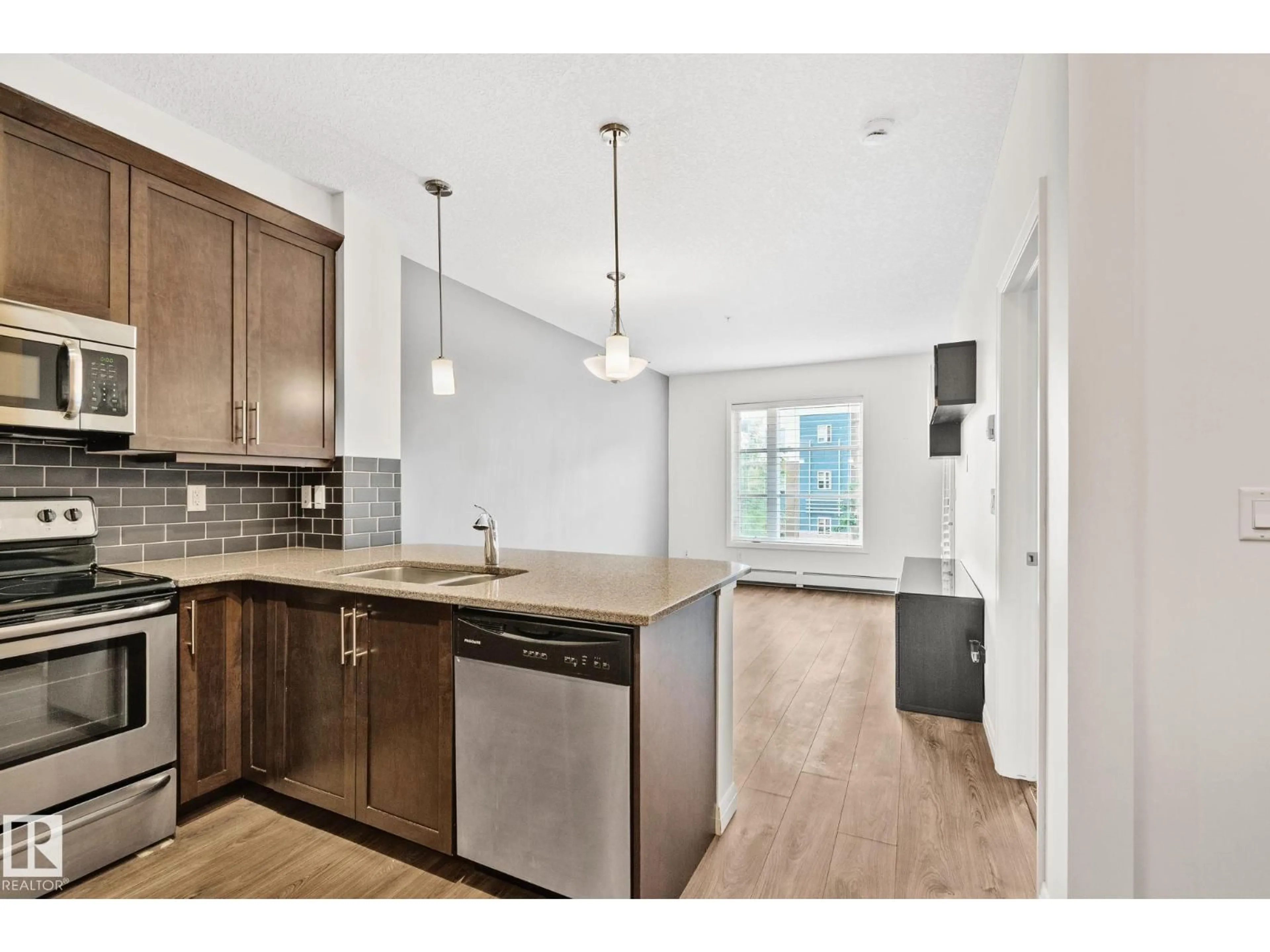 Open concept kitchen, unknown for #217 - 2588 ANDERSON WY, Edmonton Alberta T6W0R2