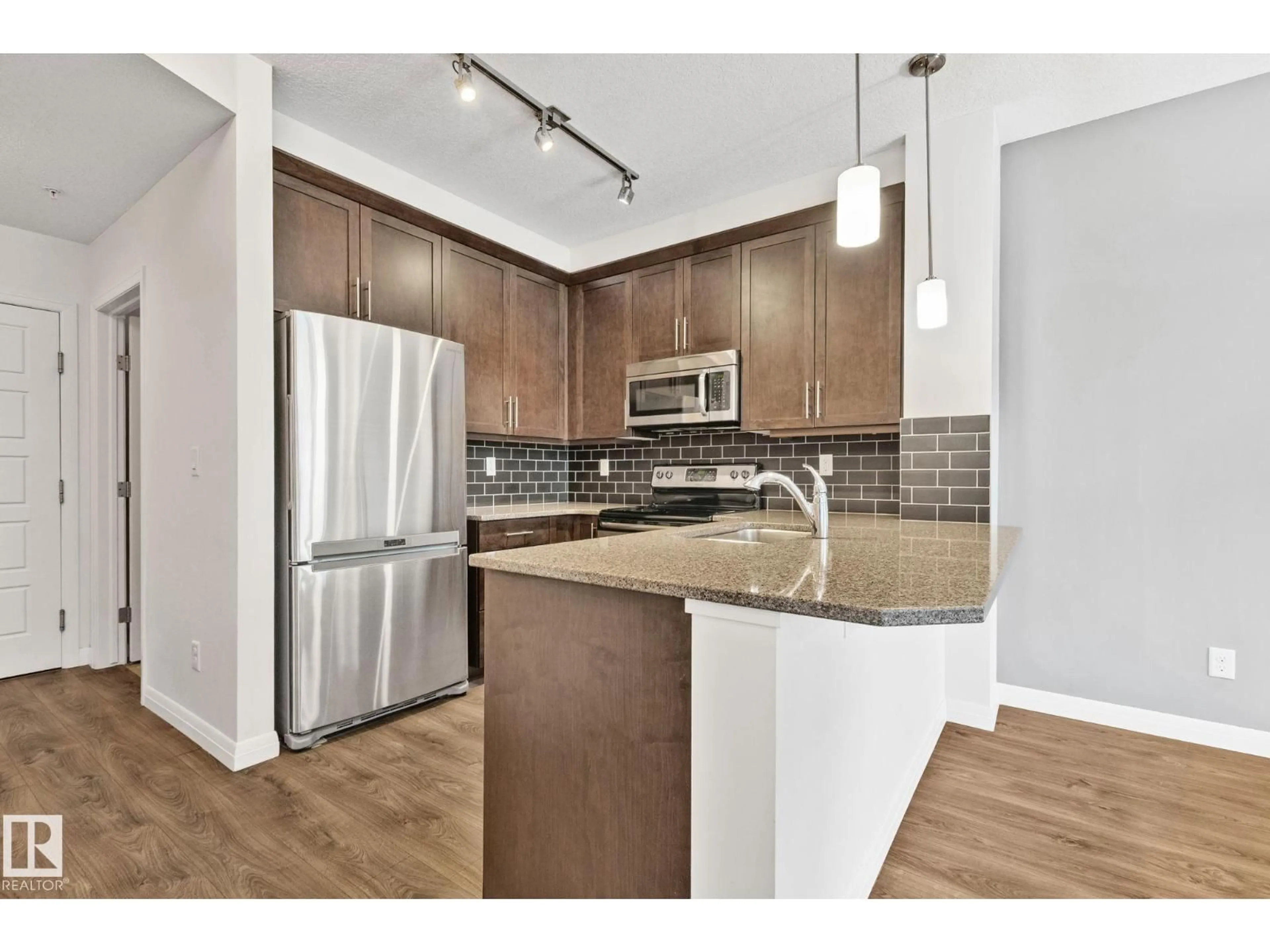 Open concept kitchen, unknown for #217 - 2588 ANDERSON WY, Edmonton Alberta T6W0R2