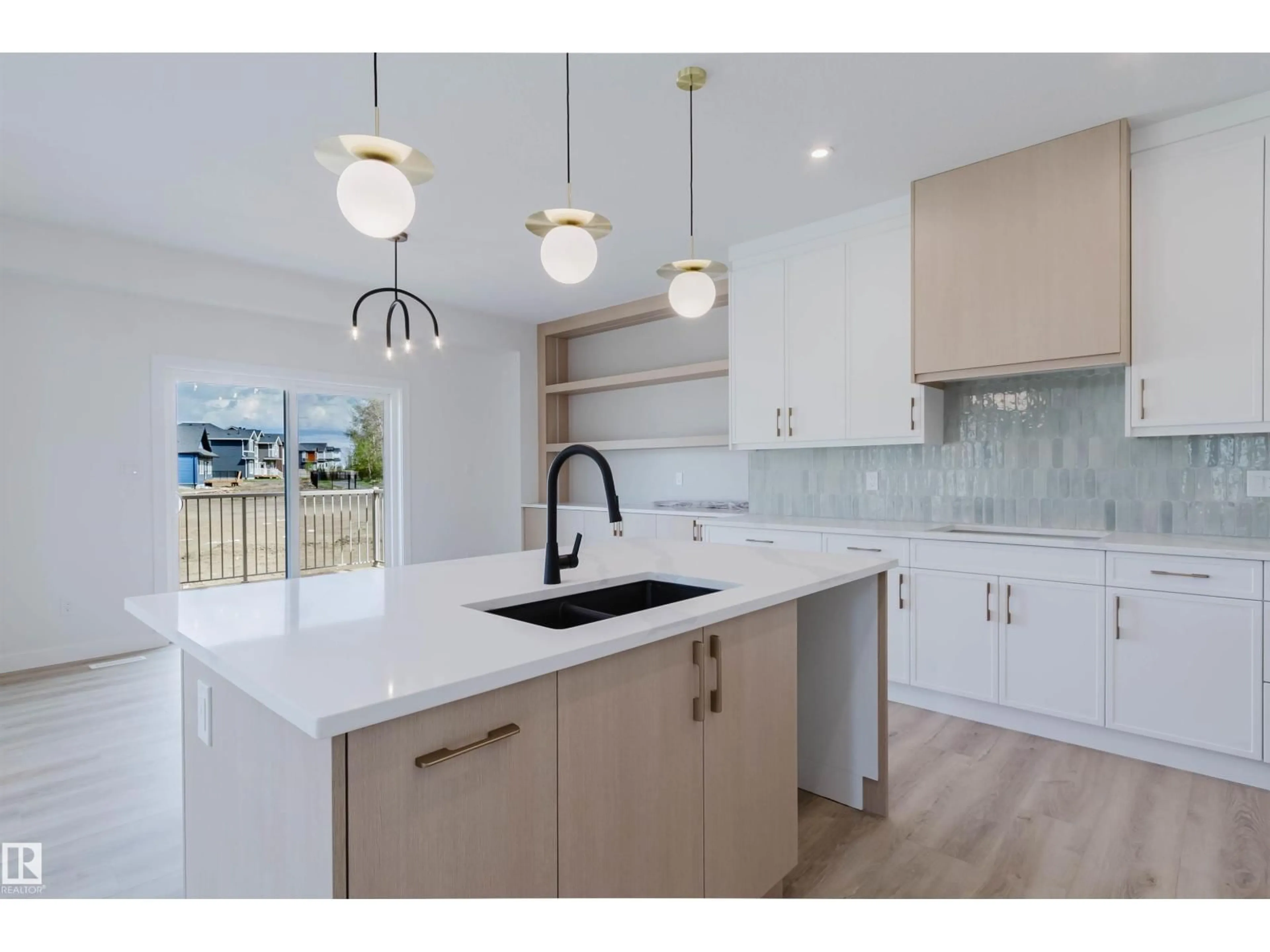 Open concept kitchen, ceramic/tile floor for 703 ELDERBERRY CL, Edmonton Alberta T6M3J6