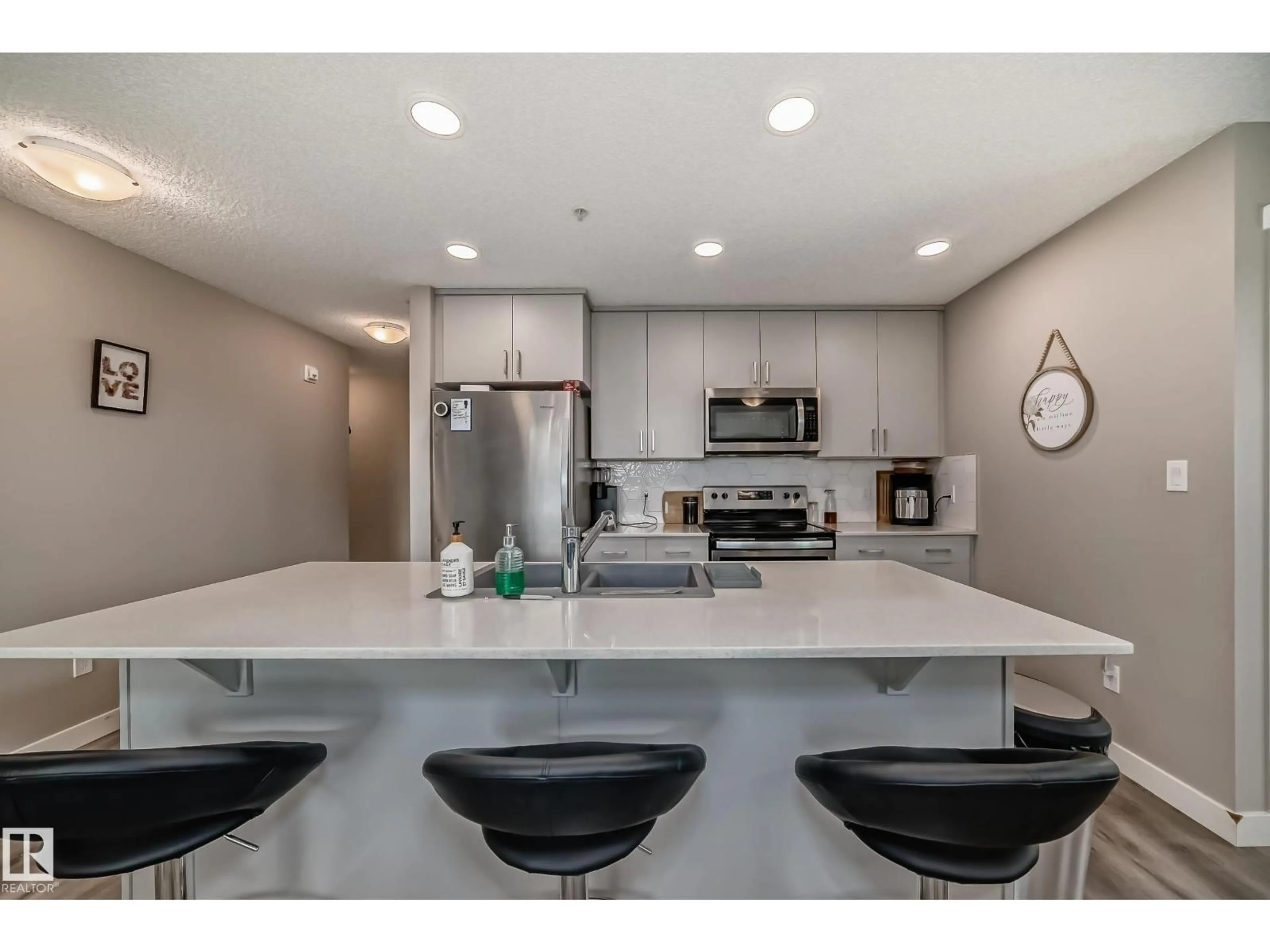 Open concept kitchen, ceramic/tile floor for #103 - 1506 TAMARACK BV, Edmonton Alberta T6T2J5