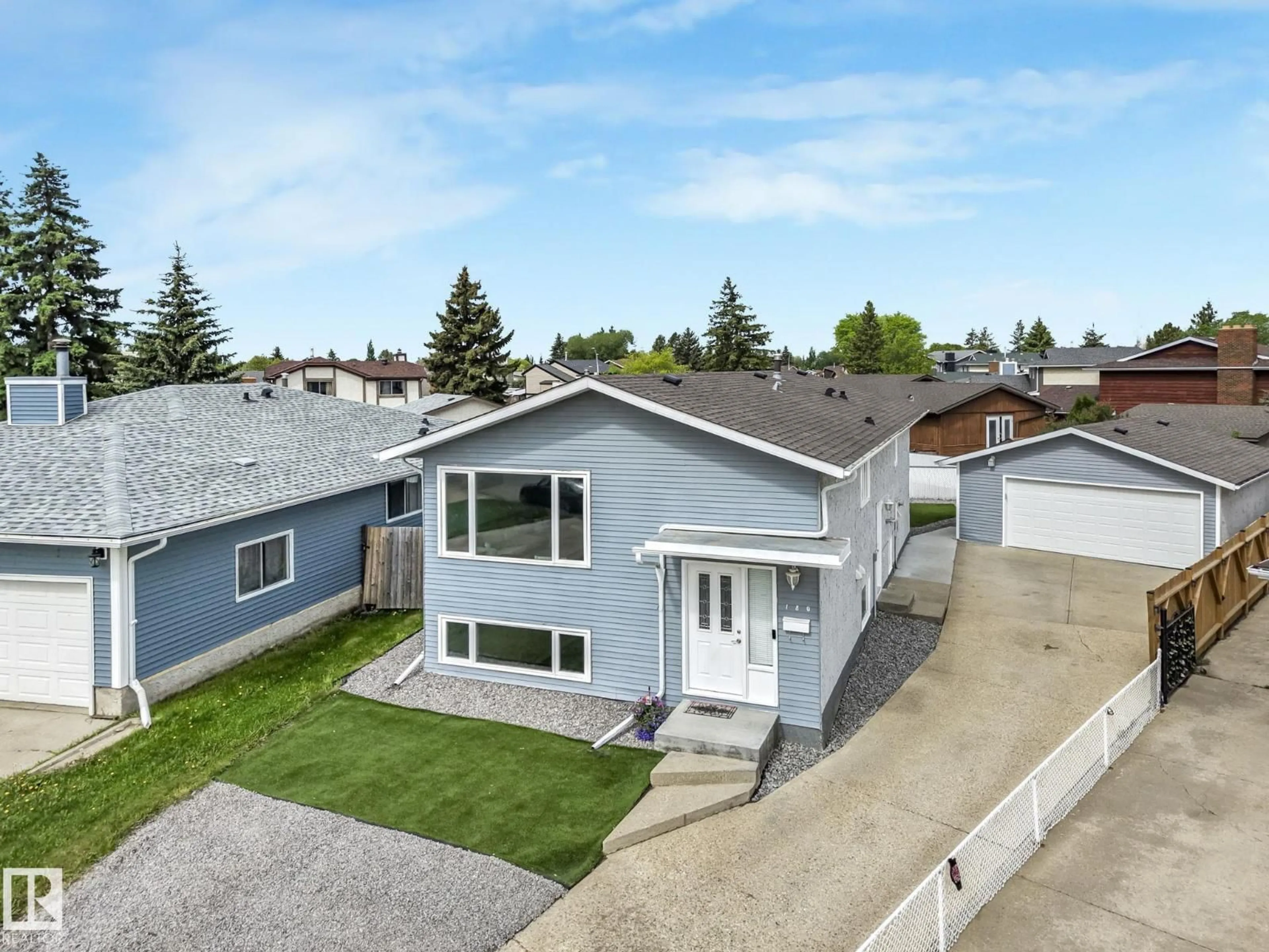 A pic from outside/outdoor area/front of a property/back of a property/a pic from drone, street for 180 DUNLUCE RD, Edmonton Alberta T5X4N9