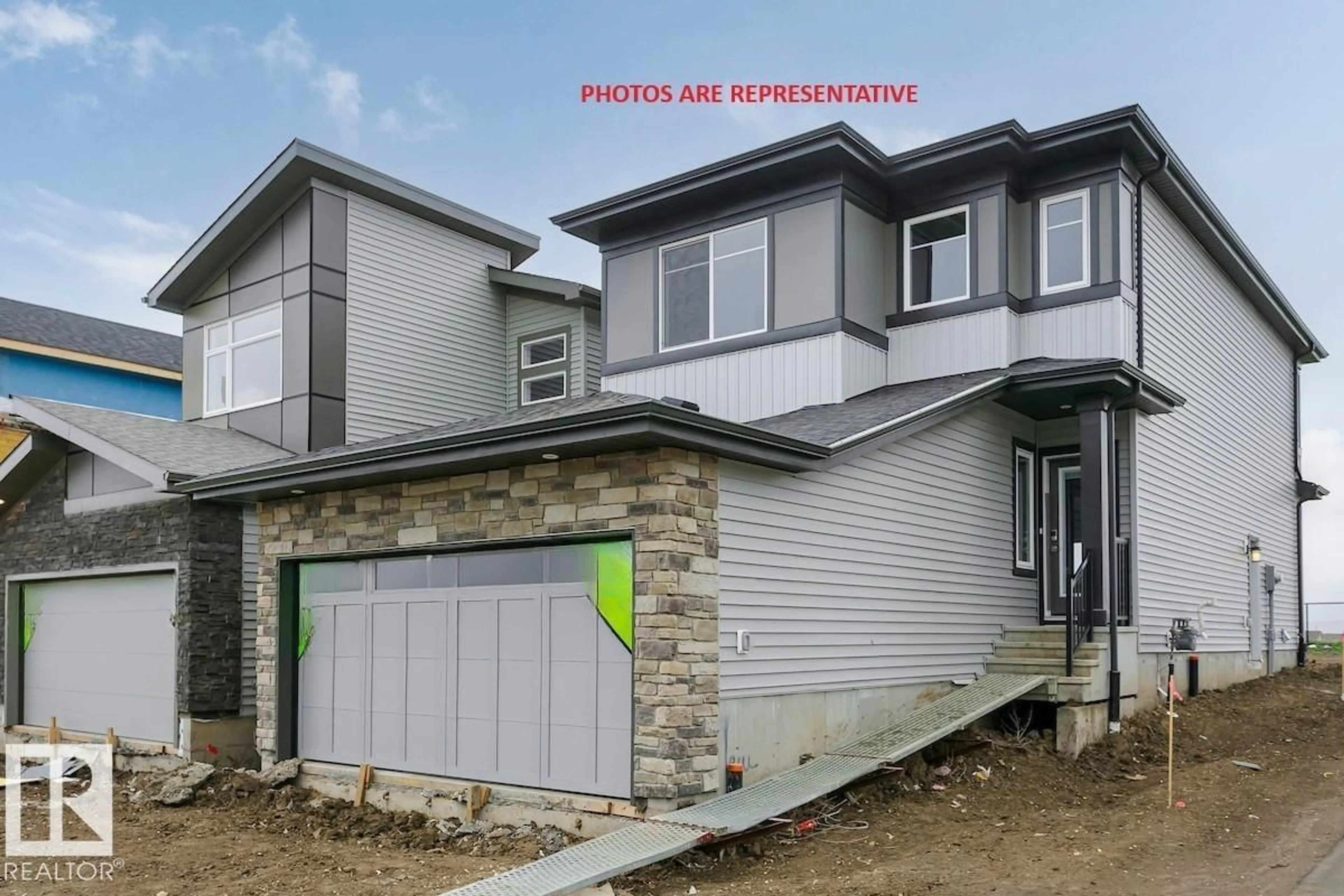 Home with vinyl exterior material, street for 2480 EGRET LO, Edmonton Alberta T6M3R4