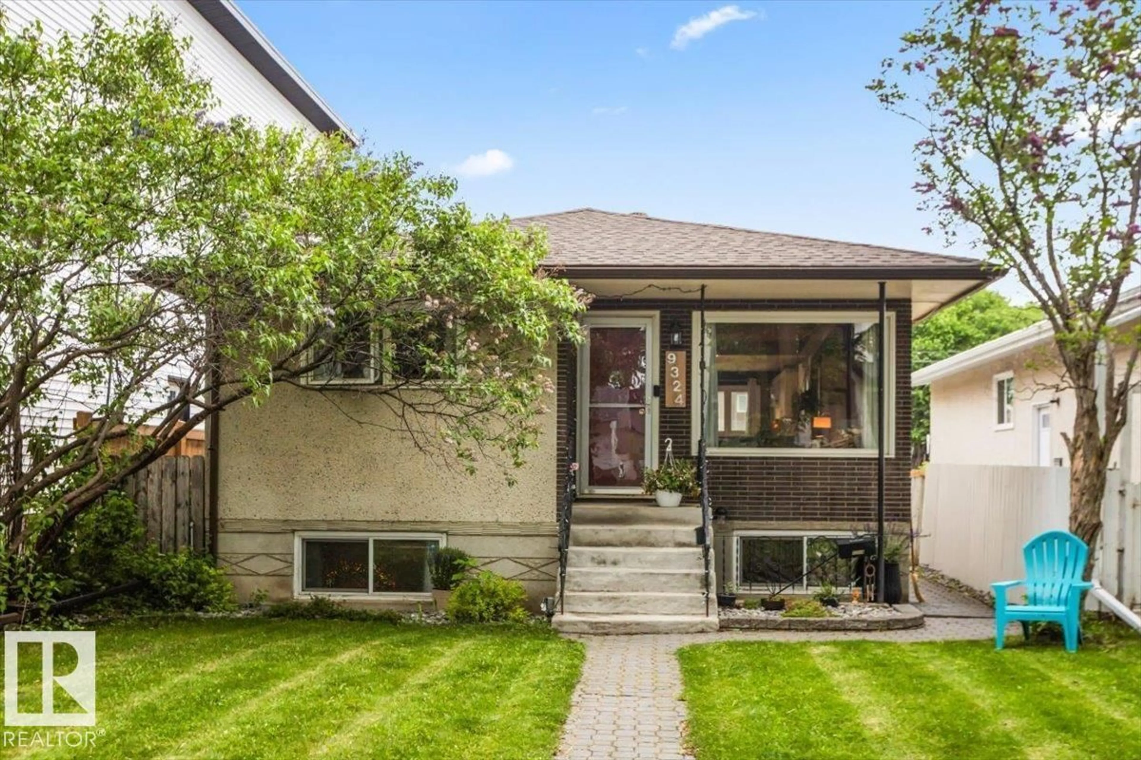 Home with brick exterior material, street for 9324 70 AV, Edmonton Alberta T6E0T7