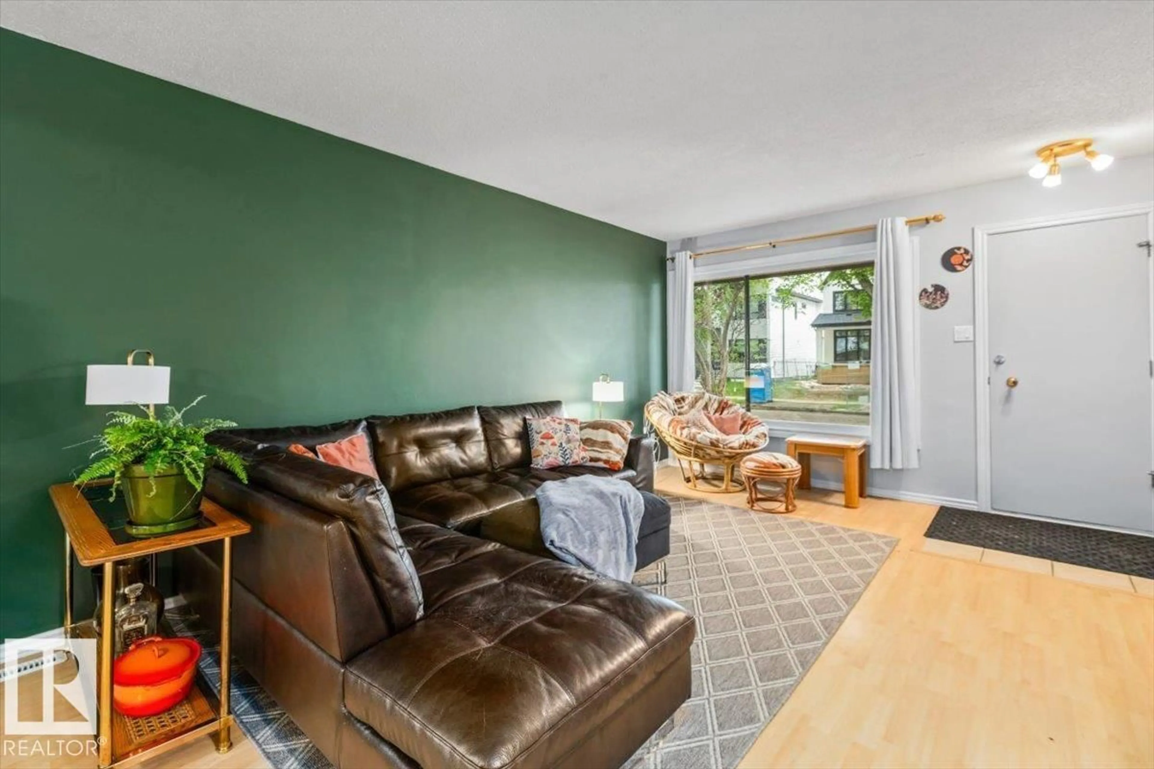 Living room with furniture, unknown for 9324 70 AV, Edmonton Alberta T6E0T7
