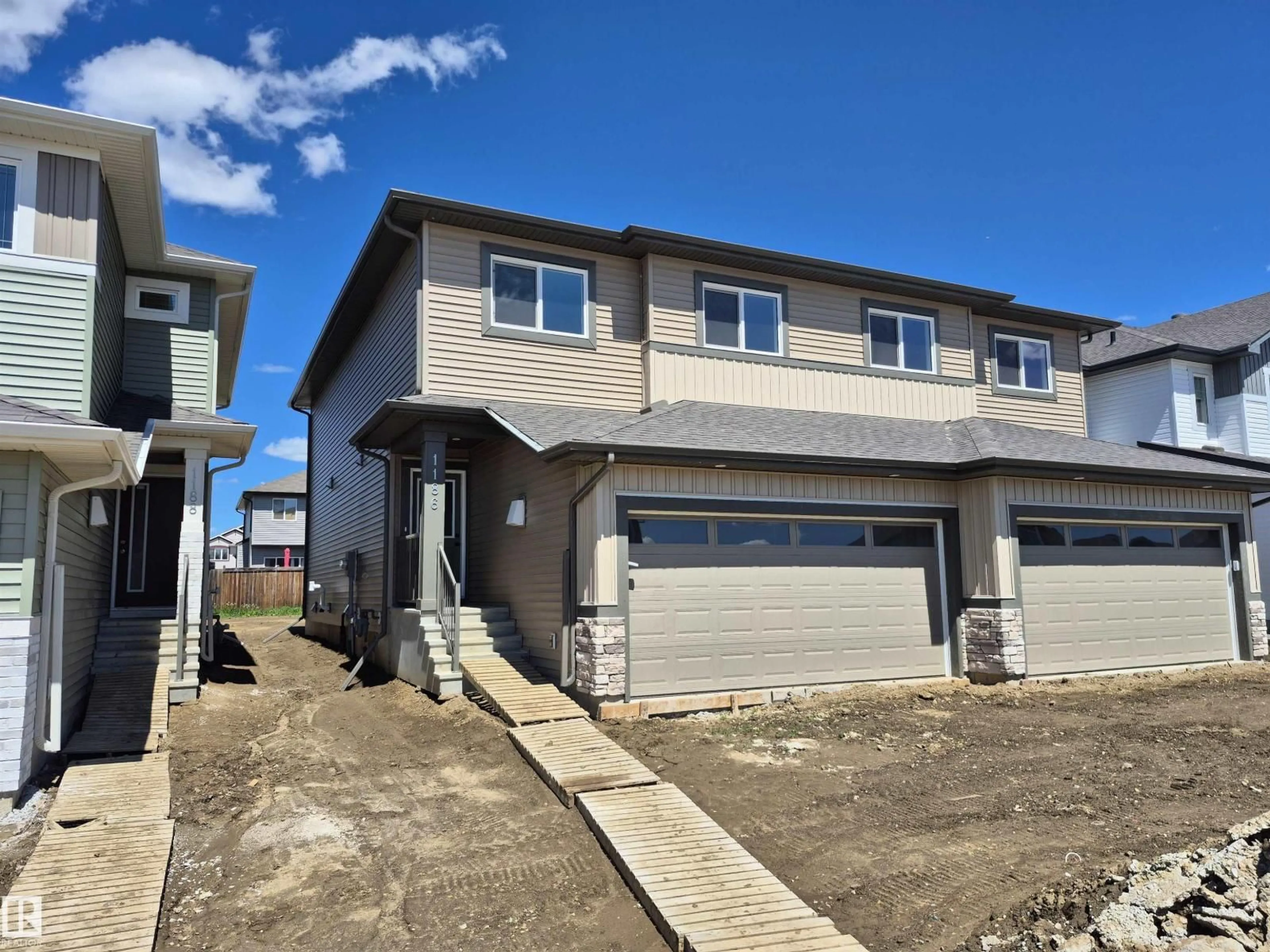 A pic from outside/outdoor area/front of a property/back of a property/a pic from drone, street for 1186 SOUTH CREEK WD, Stony Plain Alberta T7Z0P5