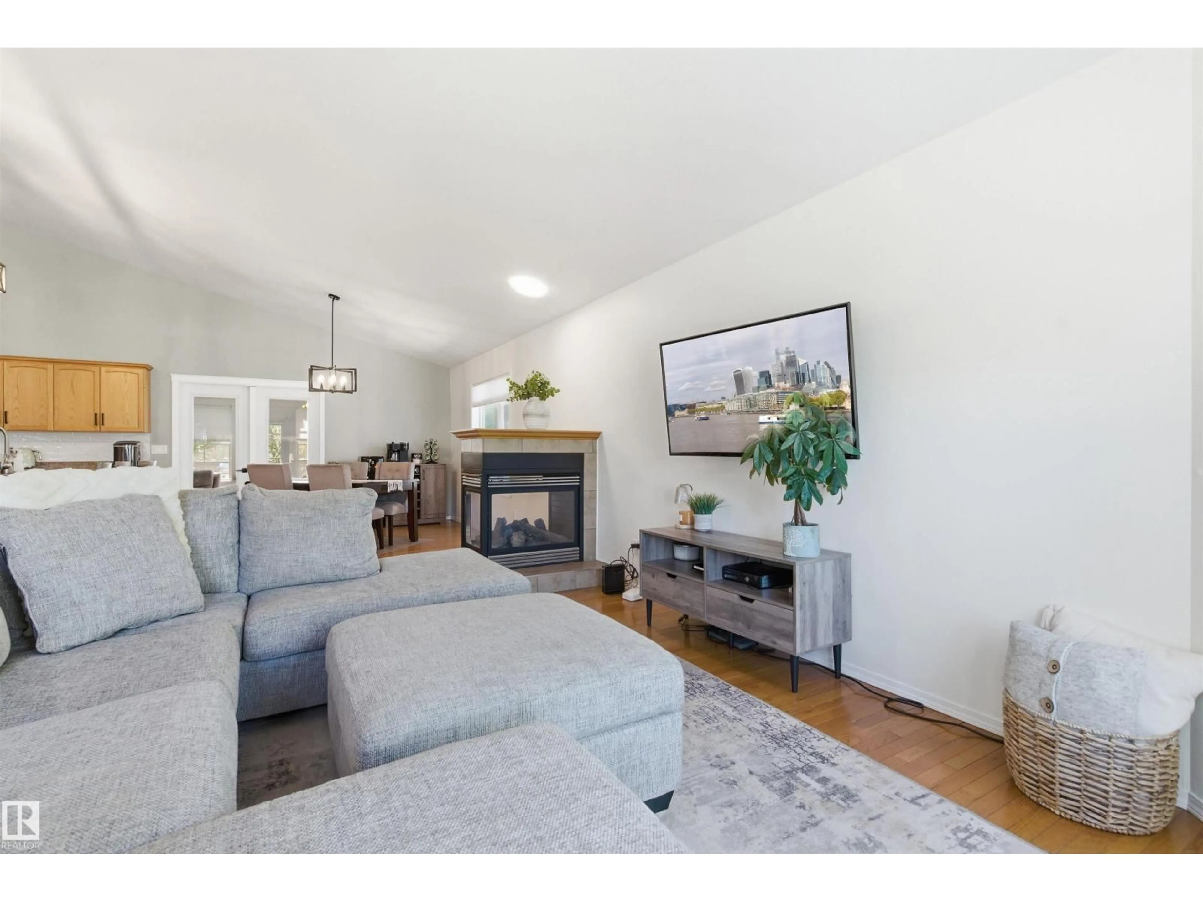 Living room with furniture, wood/laminate floor for 2309 3 AV, Cold Lake Alberta T9M0A4