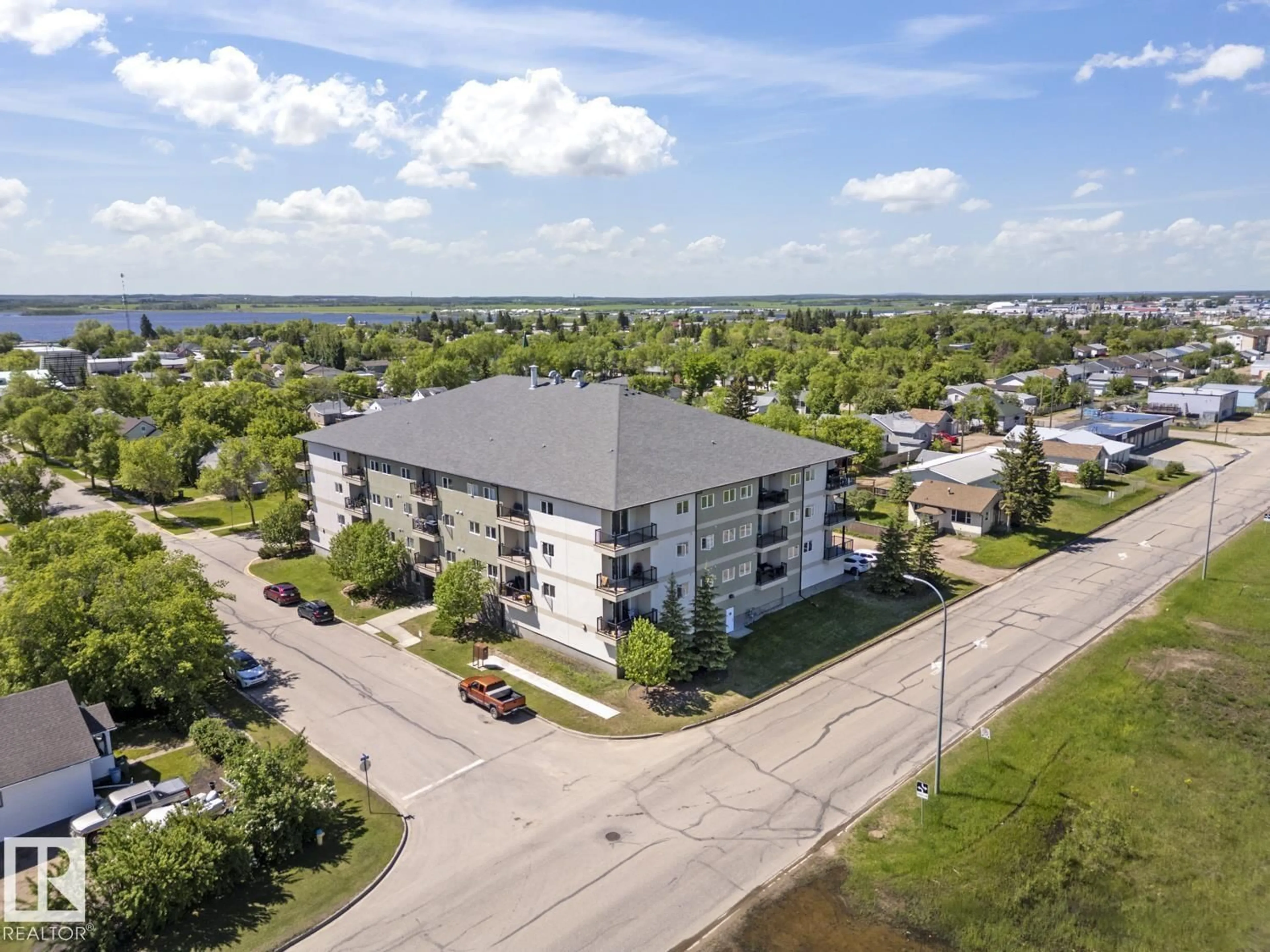 A pic from outside/outdoor area/front of a property/back of a property/a pic from drone, unknown for 307 - 5302 51 ST, Bonnyville Town Alberta T9N2J6
