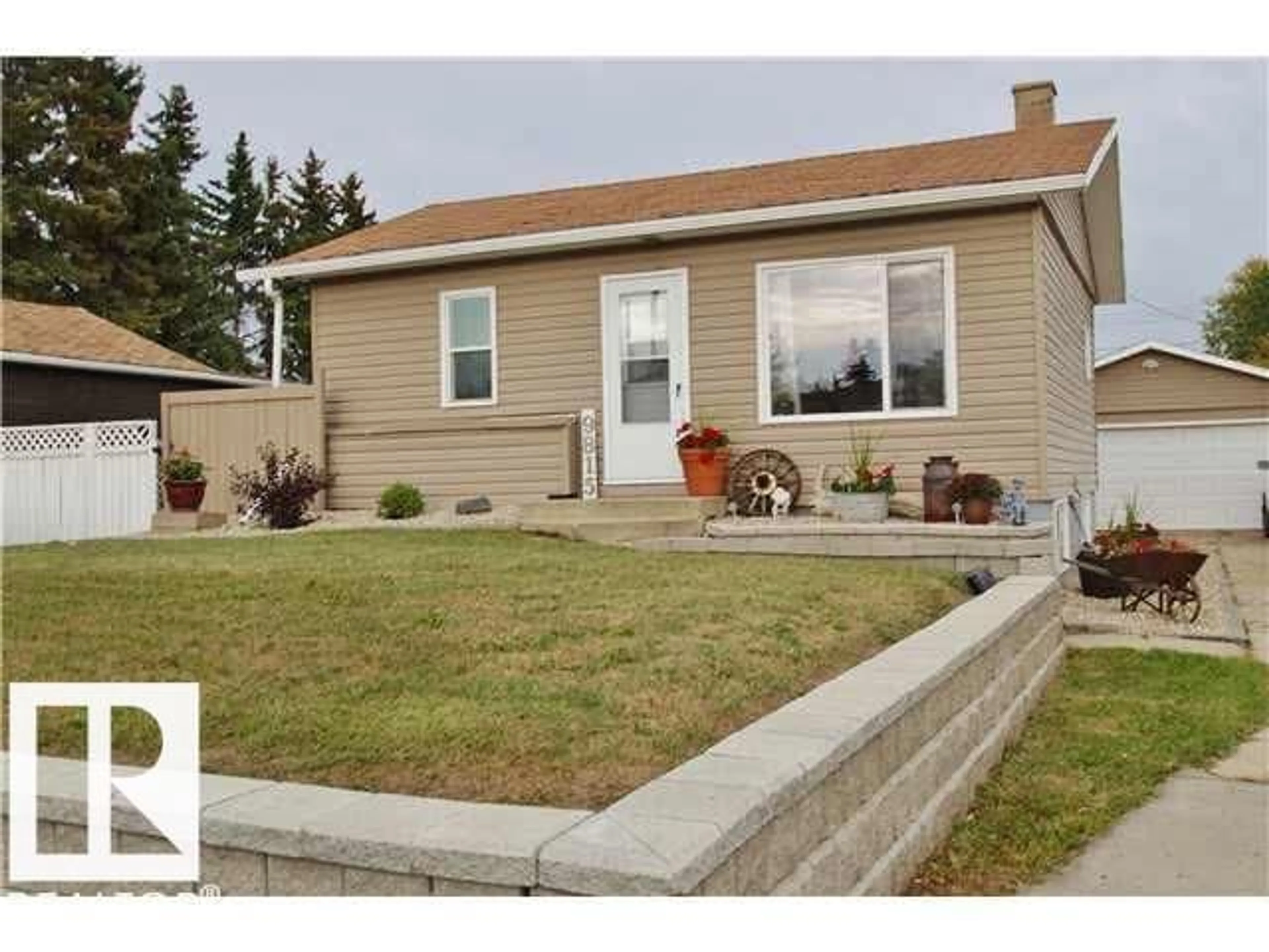 Home with vinyl exterior material, street for NW - 9815 160 ST, Edmonton Alberta T5P3E2