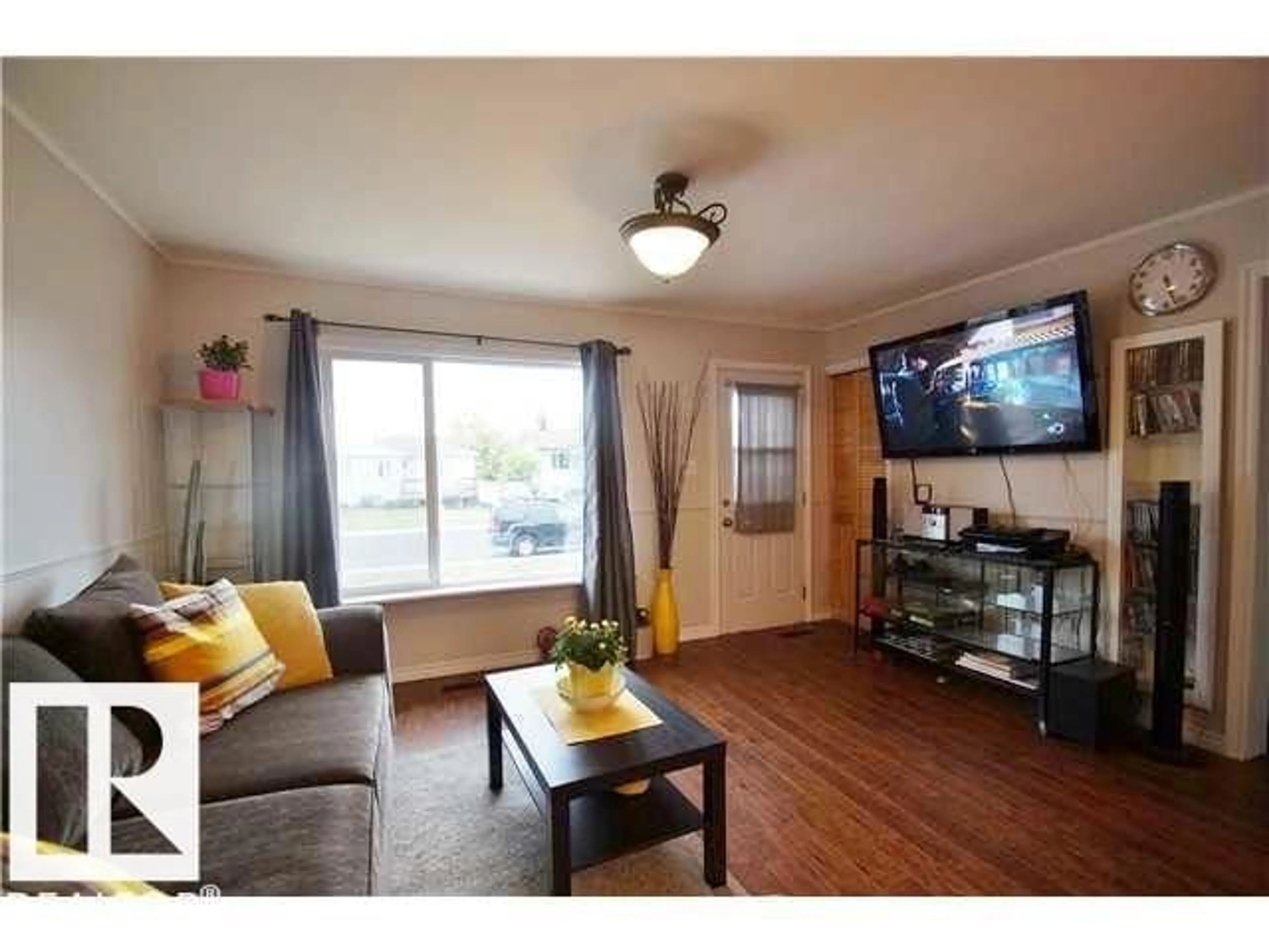 Living room with furniture, wood/laminate floor for NW - 9815 160 ST, Edmonton Alberta T5P3E2