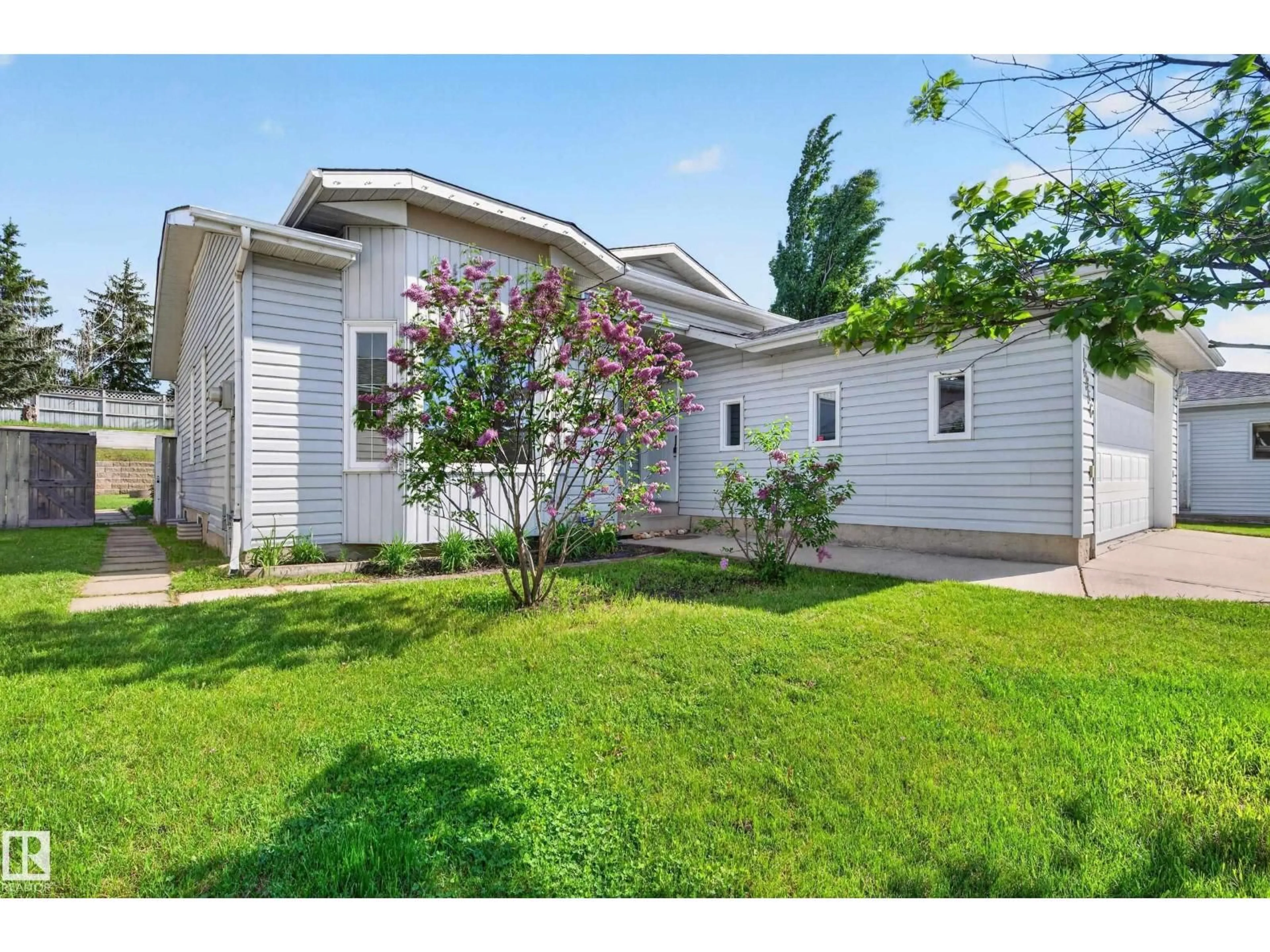 Home with vinyl exterior material, street for 18956 78 AV, Edmonton Alberta T5T5H7