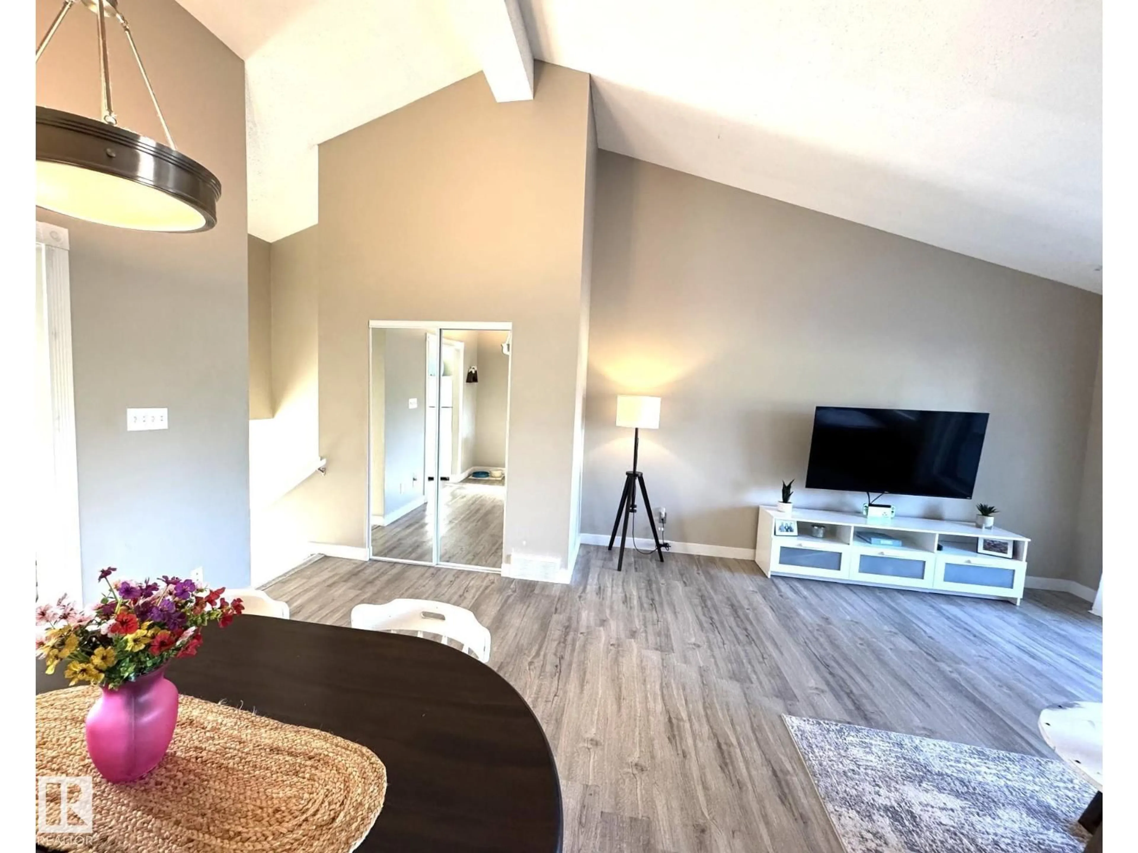 Living room with furniture, wood/laminate floor for 3 - 6220 172 ST, Edmonton Alberta T5T3R4