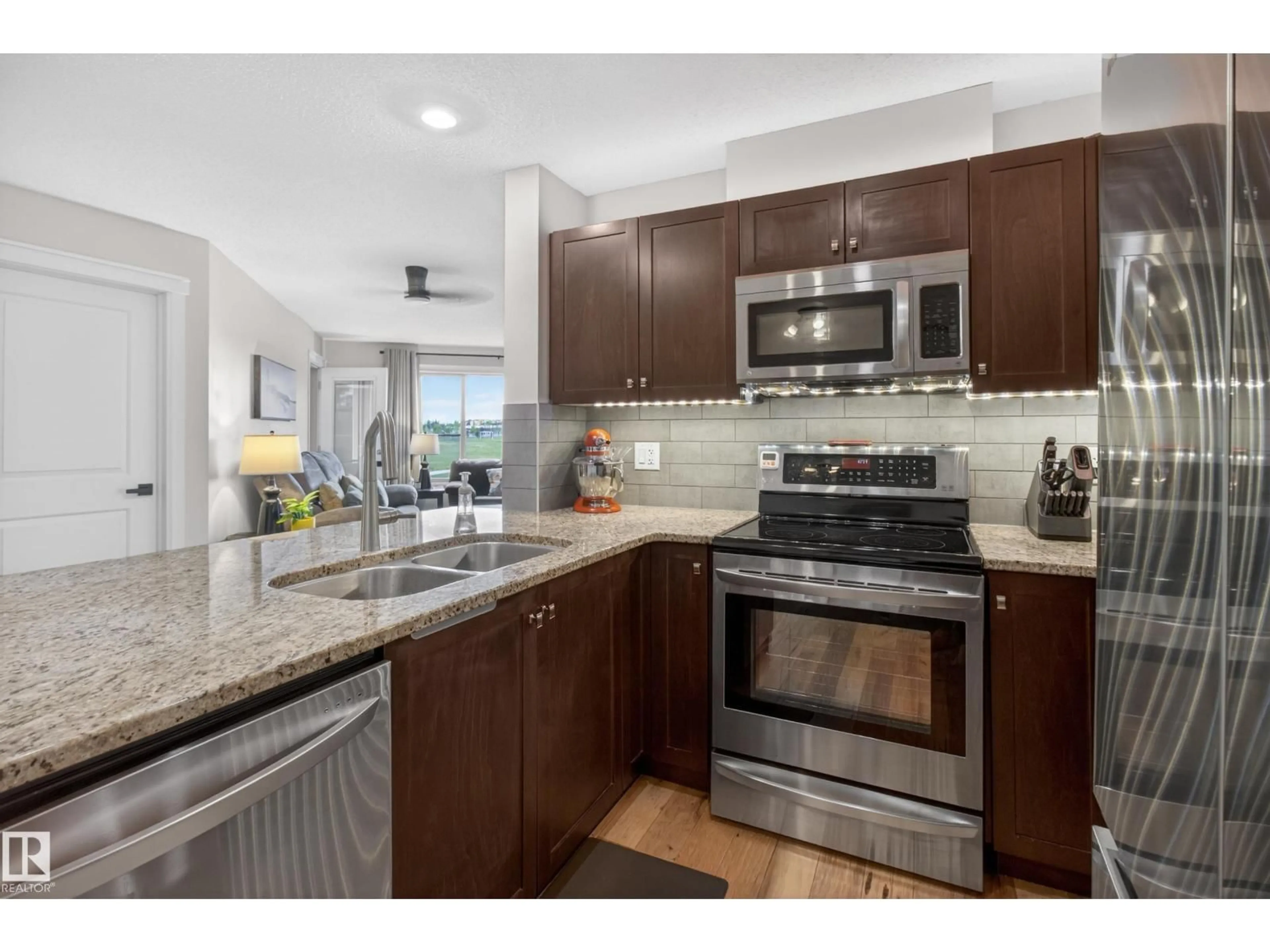 Open concept kitchen, unknown for #211 - 3719 WHITELAW LN, Edmonton Alberta T6W2C3