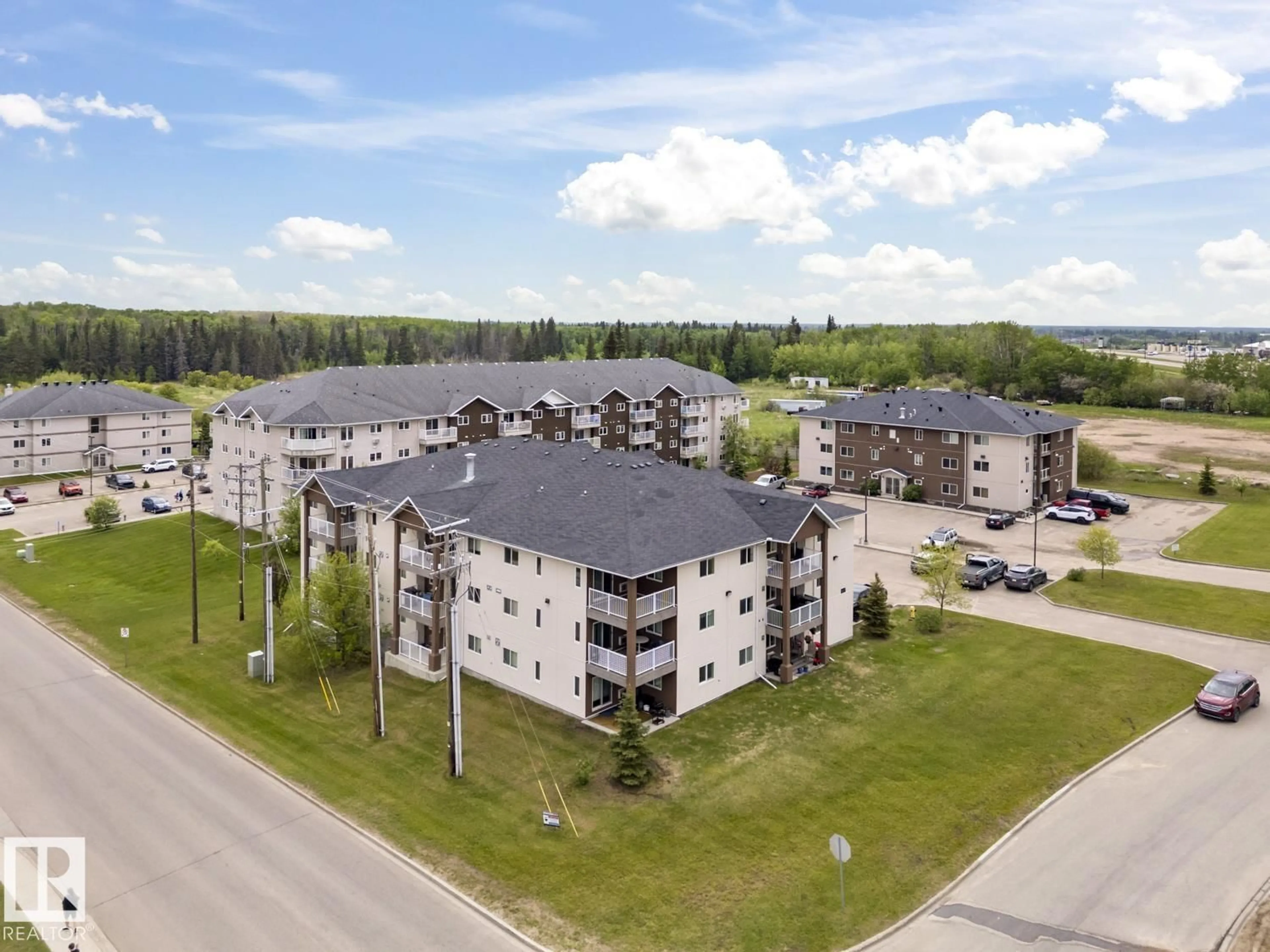 A pic from outside/outdoor area/front of a property/back of a property/a pic from drone, building for 1601 - 1302 8 AV, Cold Lake Alberta T9M0C3