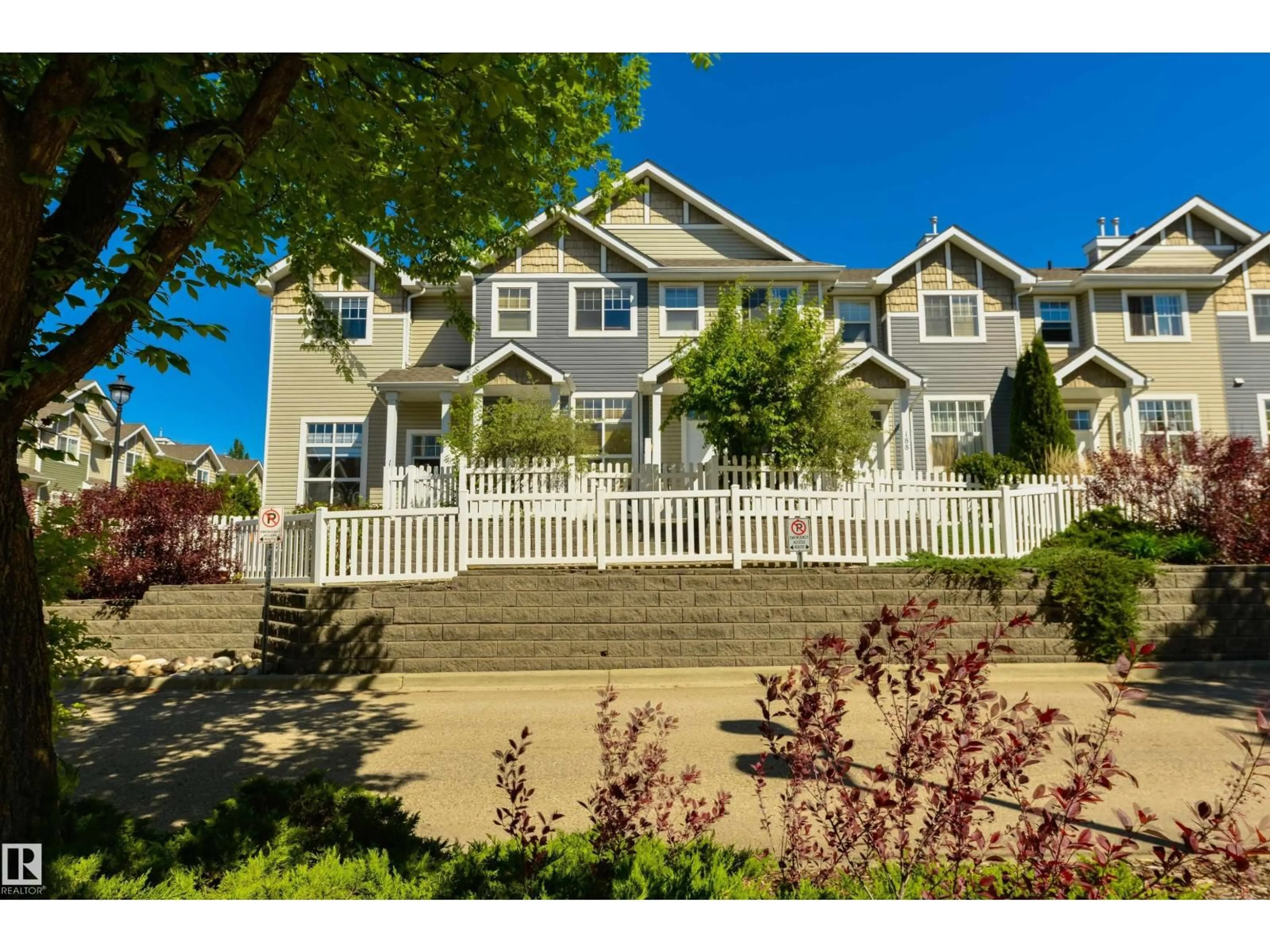 Home with vinyl exterior material, street for 189 5604 199 ST NW, Edmonton Alberta T6M2Z9
