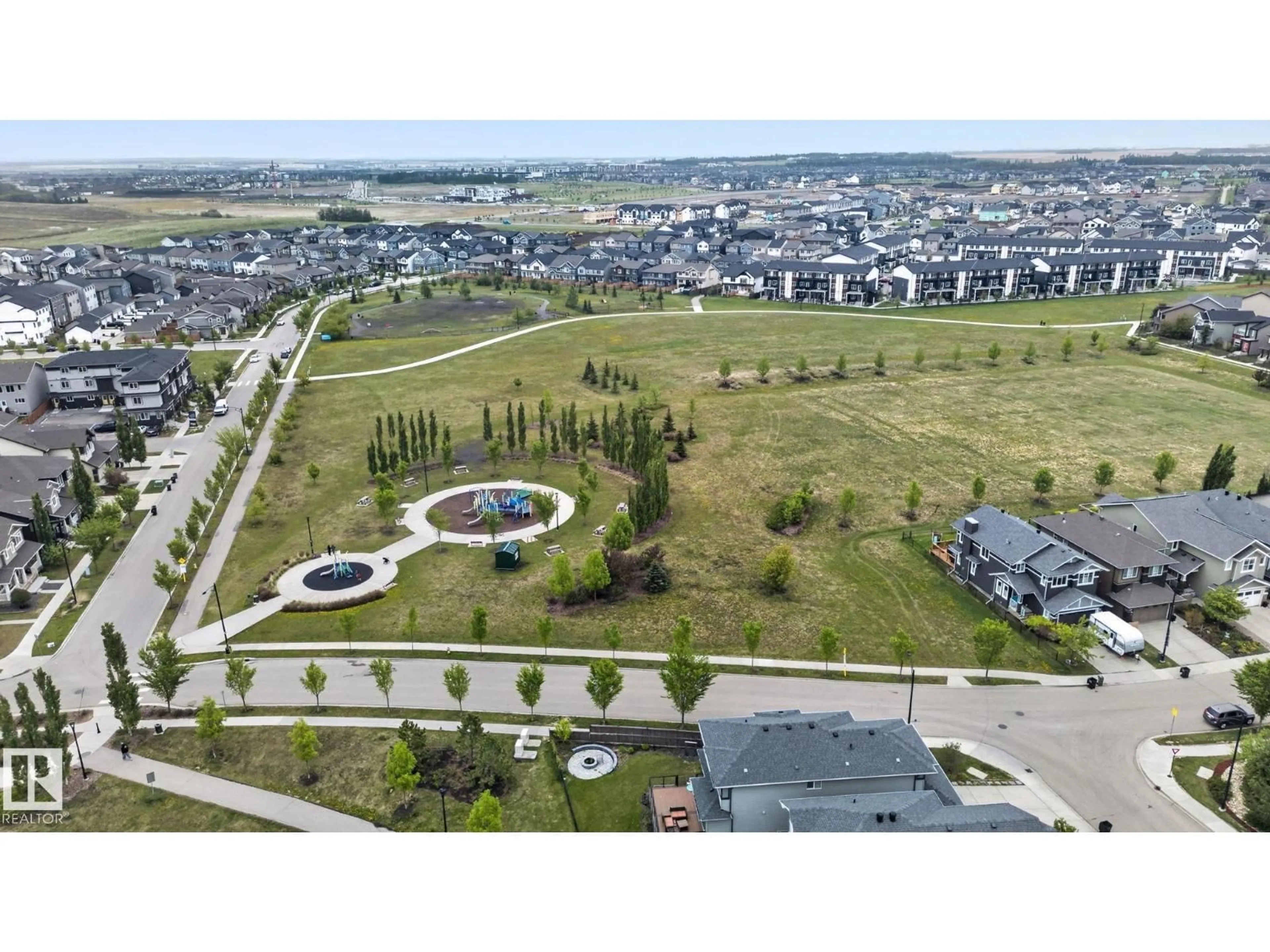 A pic from outside/outdoor area/front of a property/back of a property/a pic from drone, unknown for SW - 3806 POWELL WD, Edmonton Alberta T6W2W9