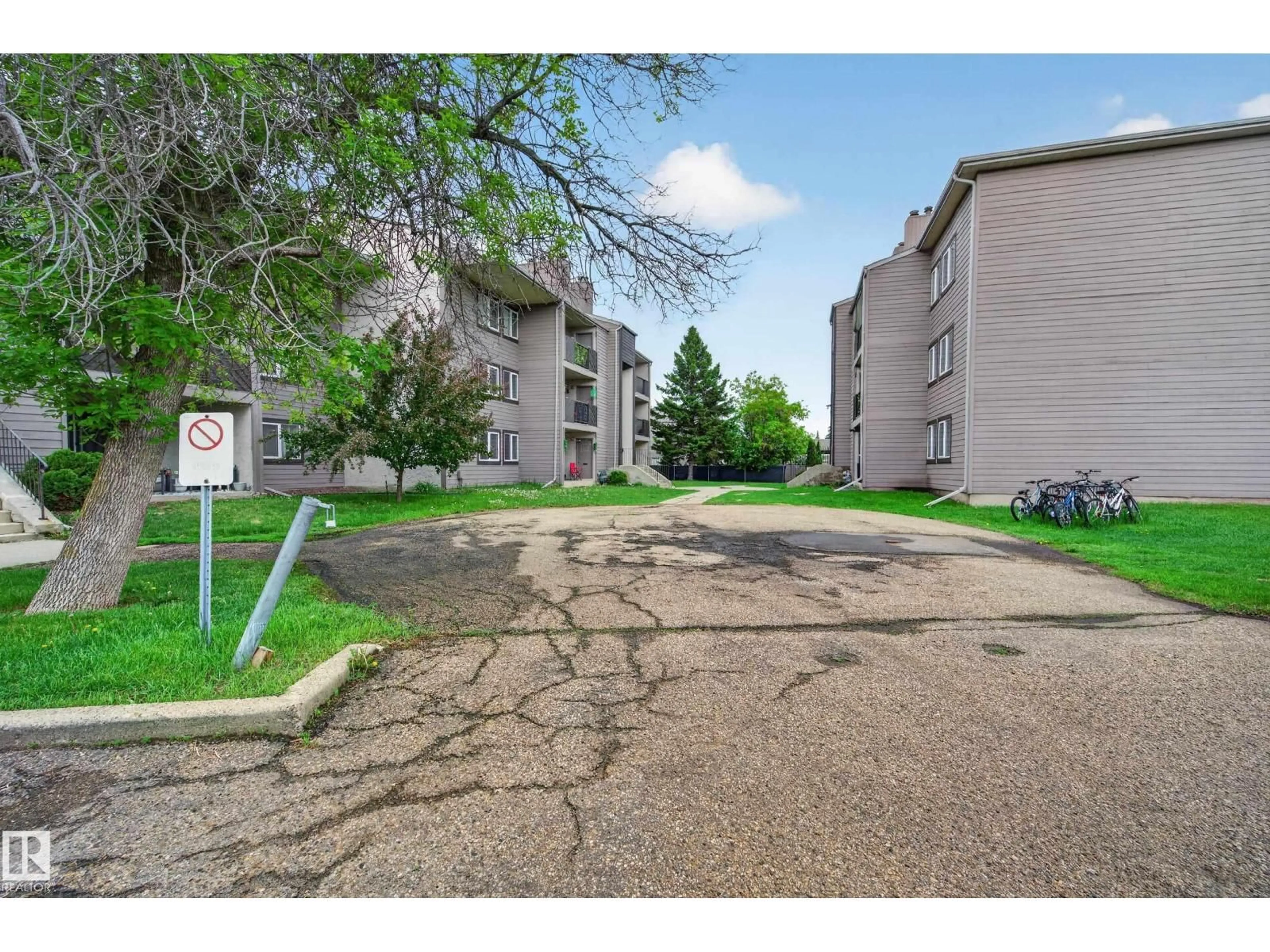 A pic from outside/outdoor area/front of a property/back of a property/a pic from drone, unknown for 201 - 49 AKINS DR, St. Albert Alberta T8N3M6