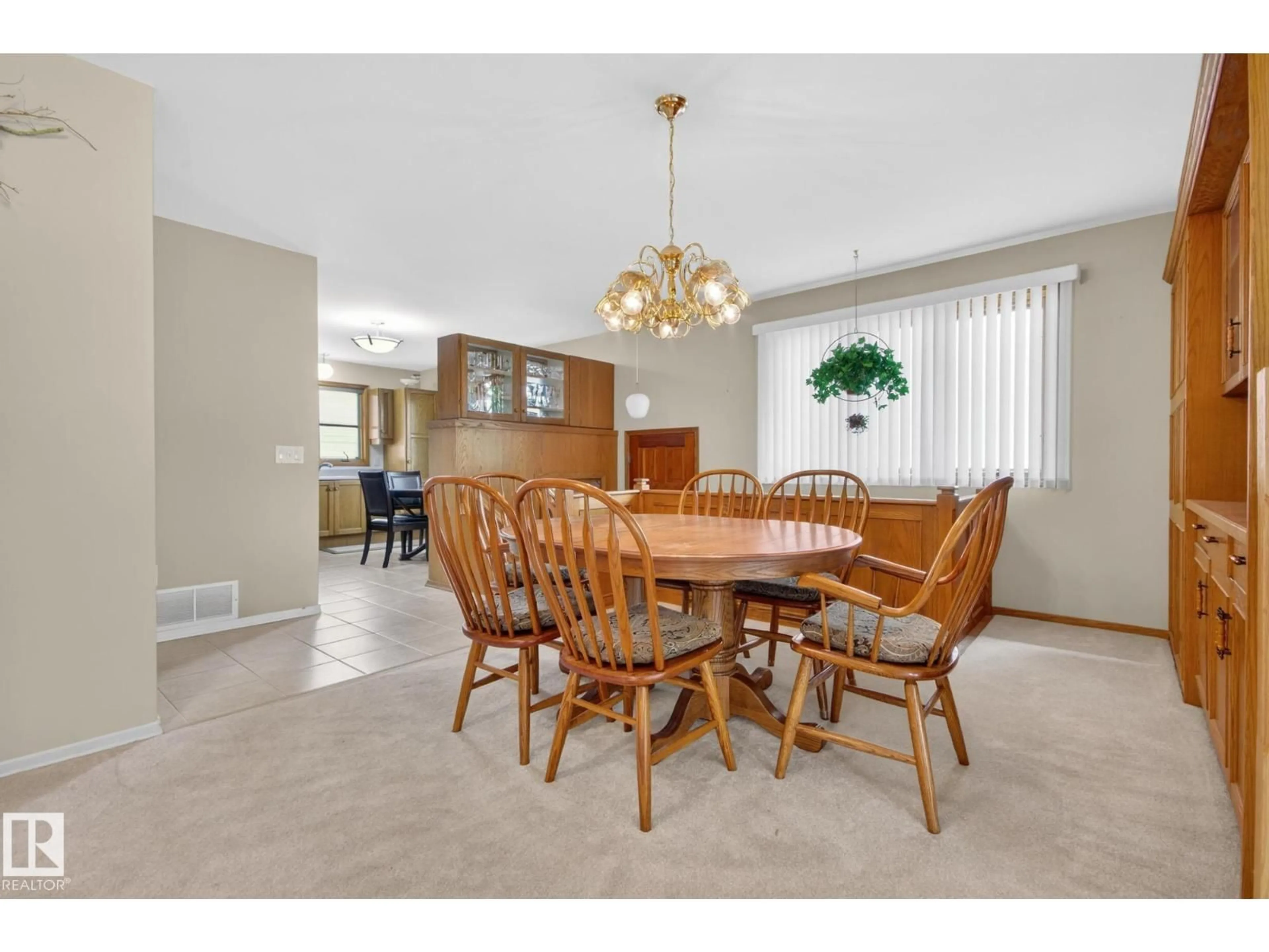 Dining room, wood/laminate floor for 9243 74 ST, Edmonton Alberta T6B2B5