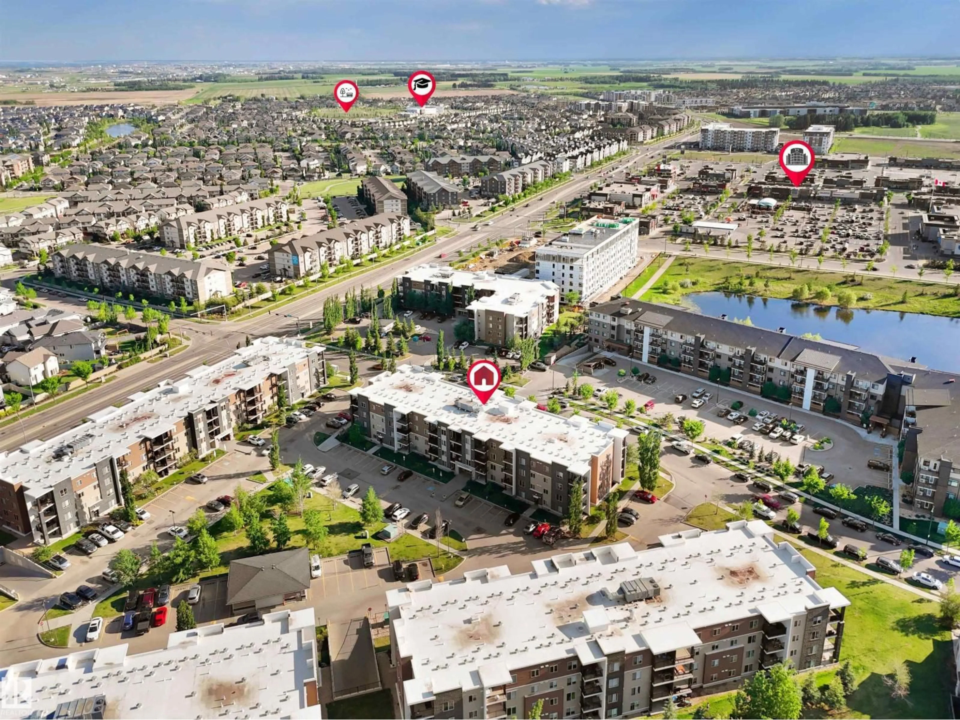 A pic from outside/outdoor area/front of a property/back of a property/a pic from drone, street for #406 - 11820 22 AV, Edmonton Alberta T6W2A2