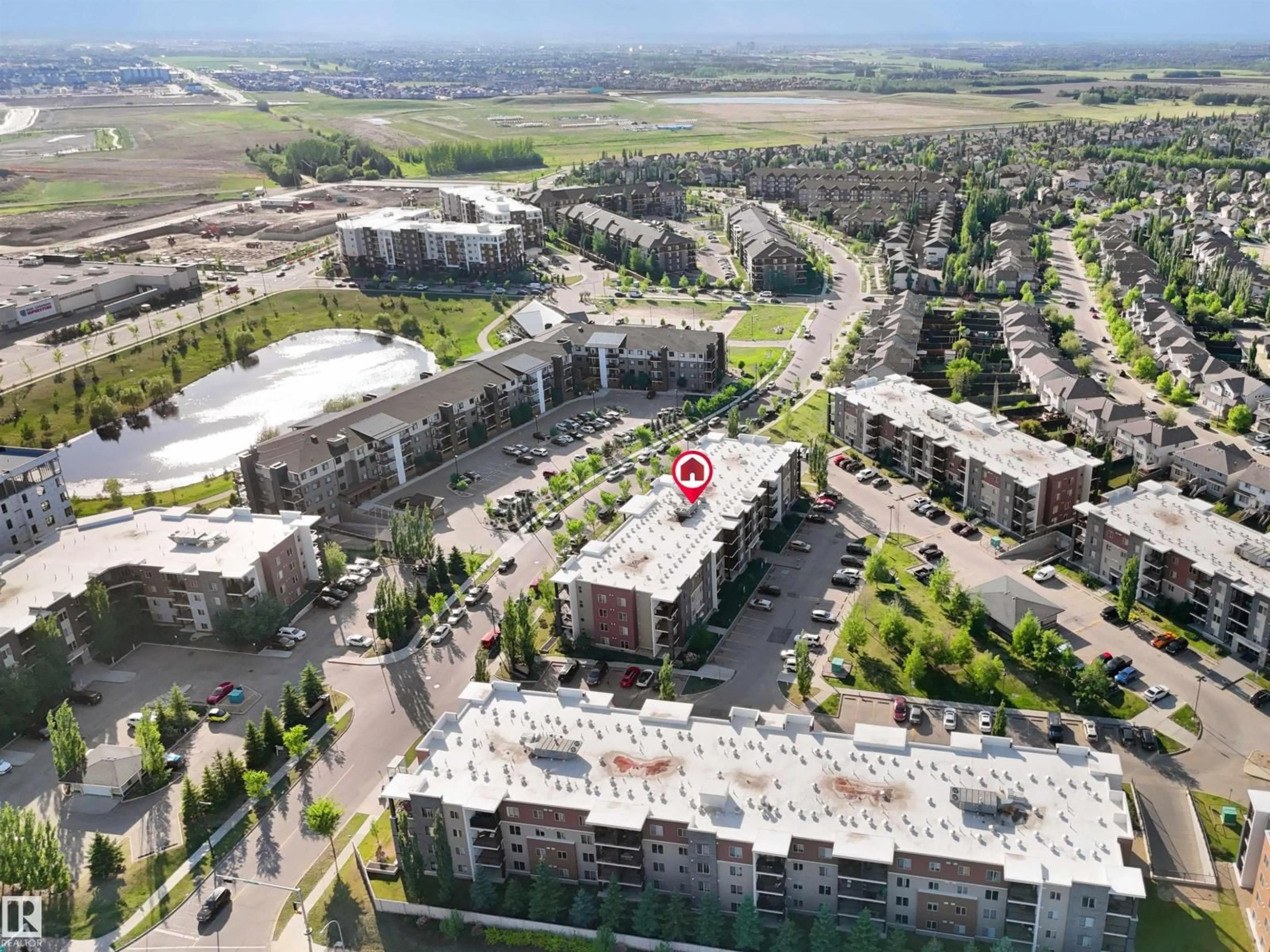 A pic from outside/outdoor area/front of a property/back of a property/a pic from drone, unknown for #406 - 11820 22 AV, Edmonton Alberta T6W2A2