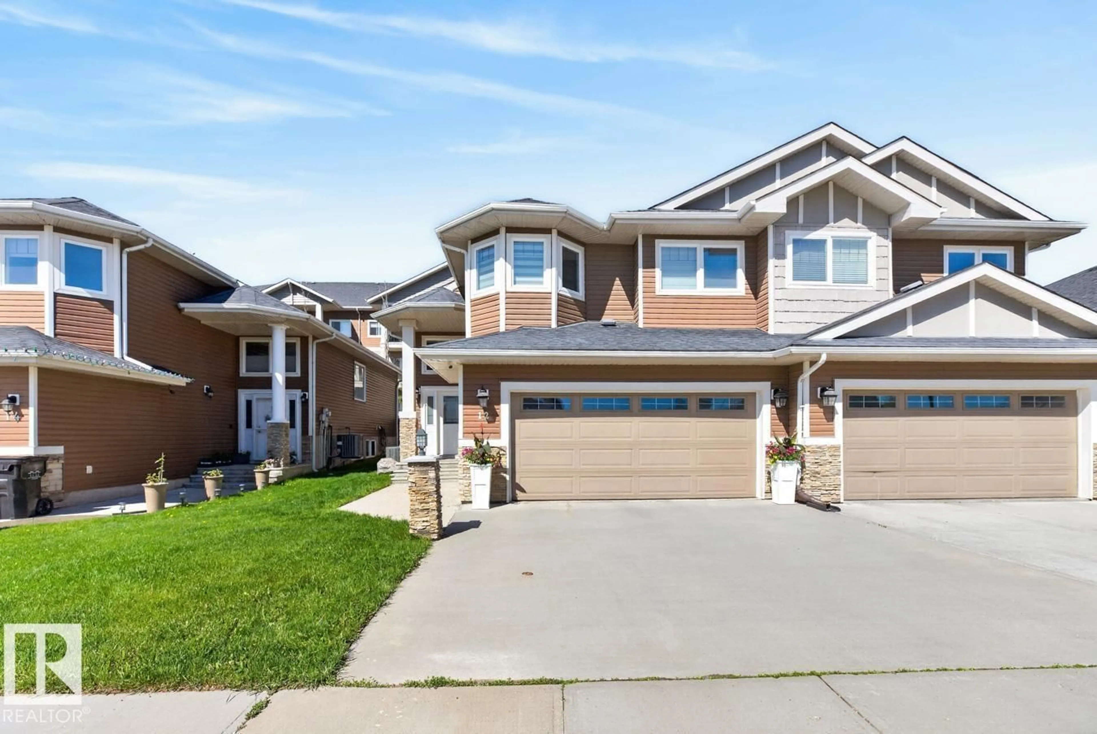 Home with vinyl exterior material, street for 12 KINGDOM PL, Leduc Alberta T9E0J2