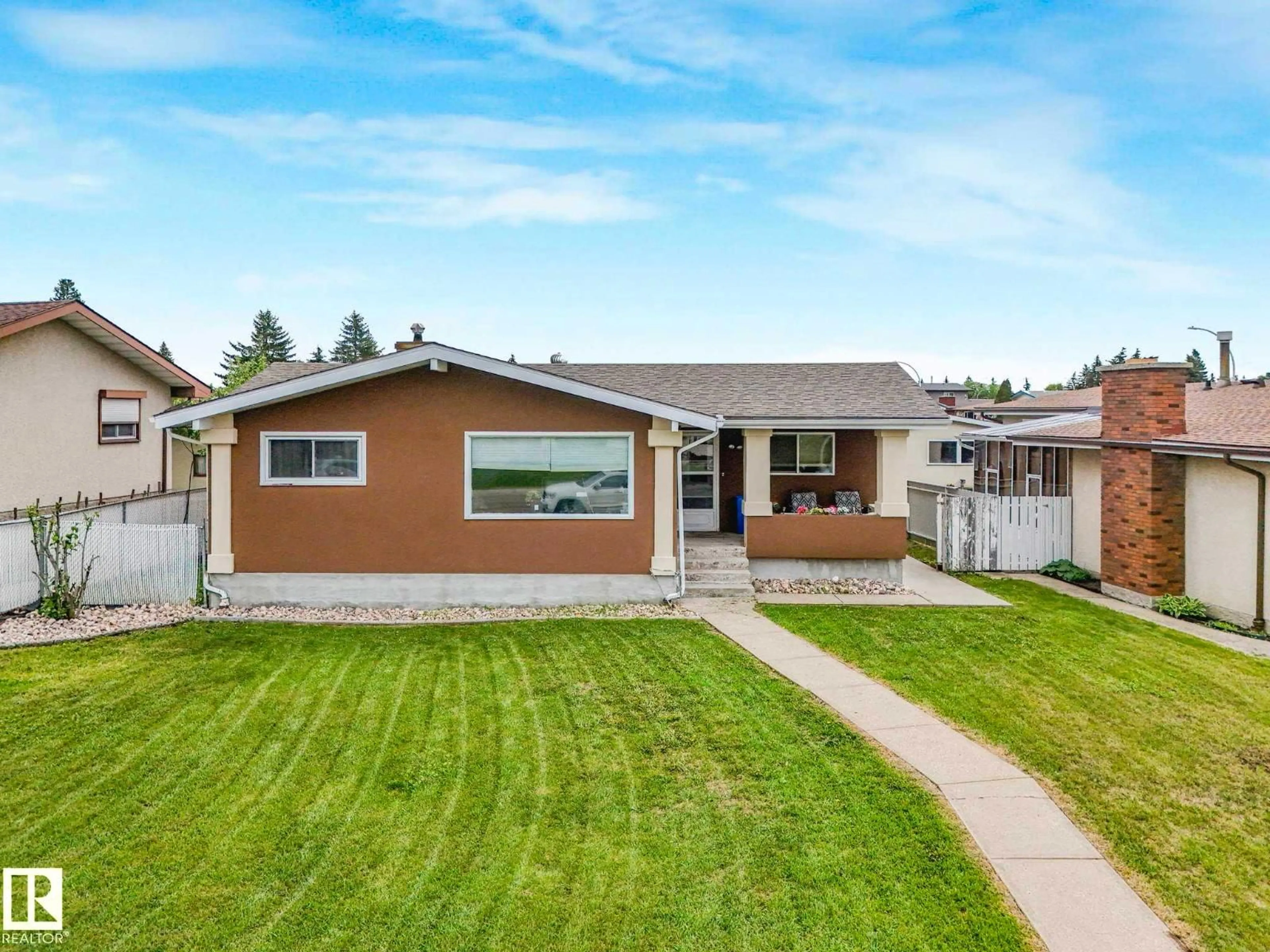 Home with vinyl exterior material, street for NW - 13807 92 ST, Edmonton Alberta T5E3S1