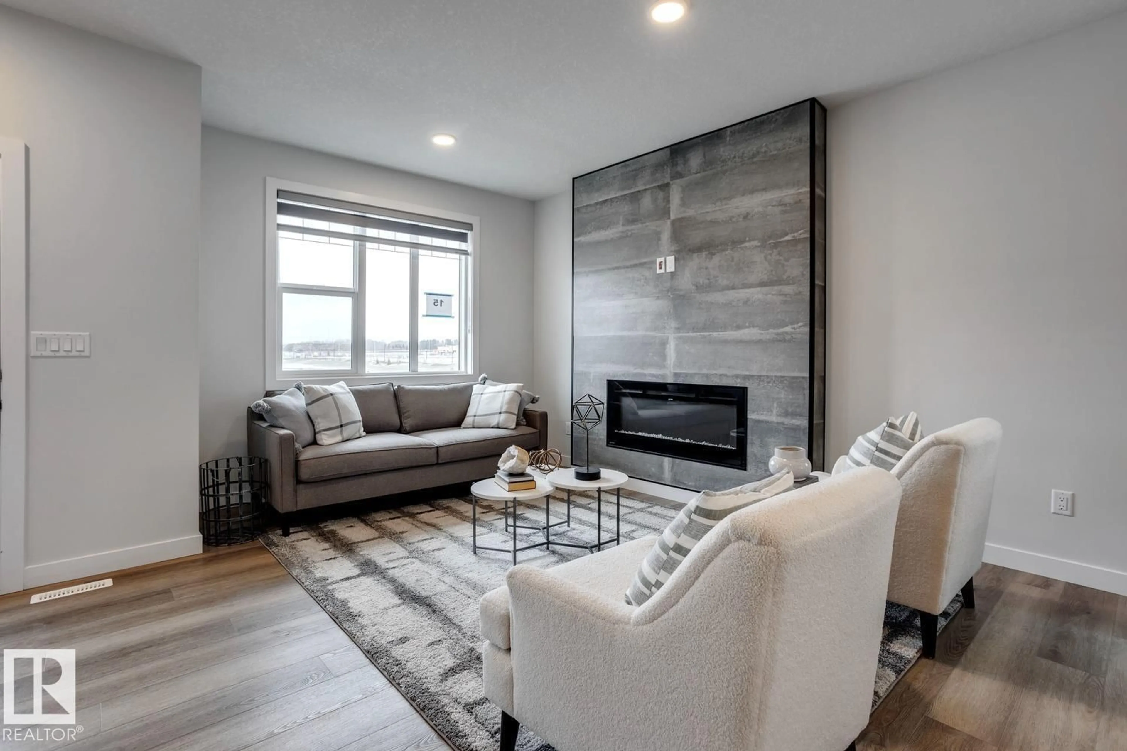 Living room with furniture, unknown for 87 SERENO LN, Fort Saskatchewan Alberta T8L0Z9