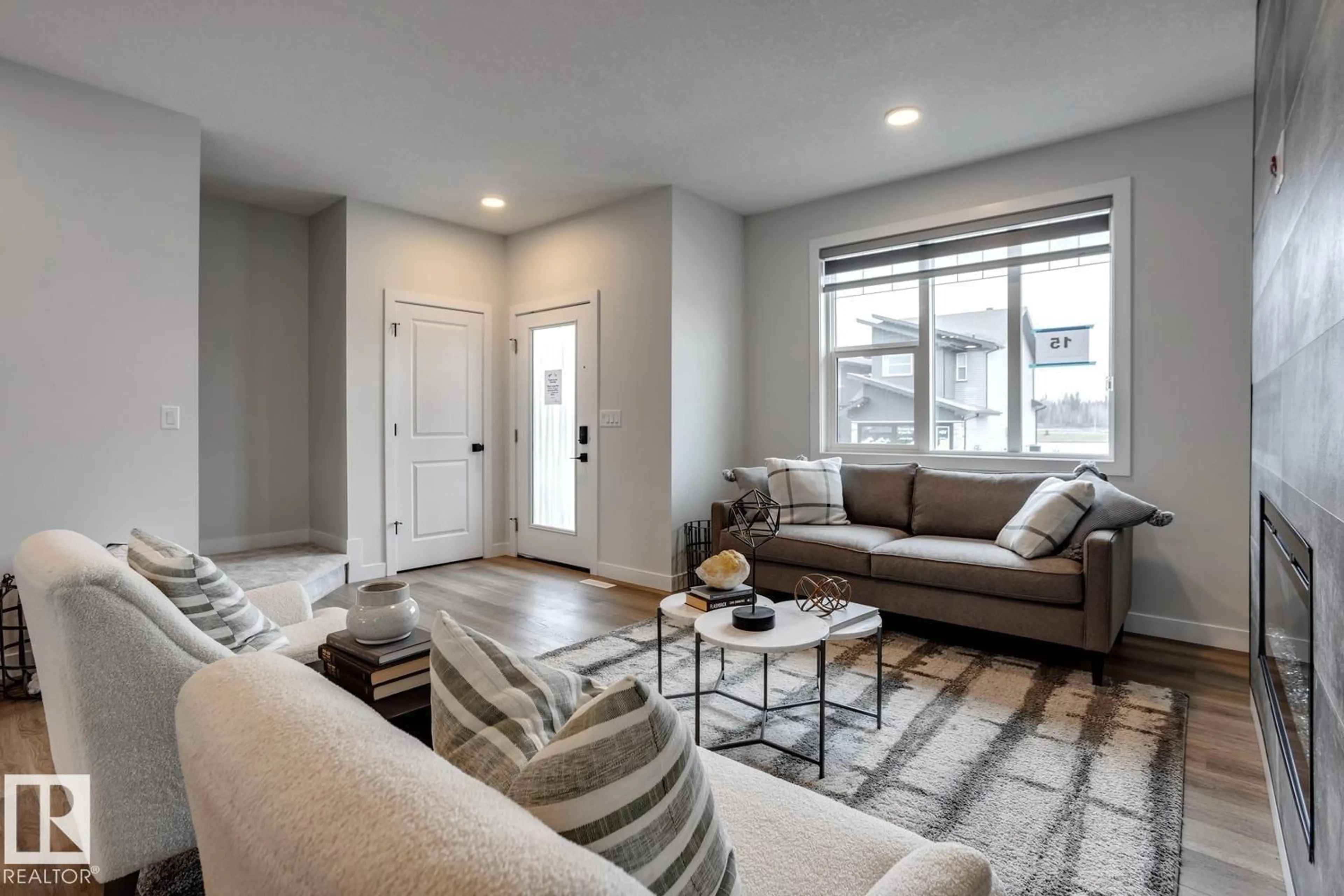Living room with furniture, unknown for 87 SERENO LN, Fort Saskatchewan Alberta T8L0Z9