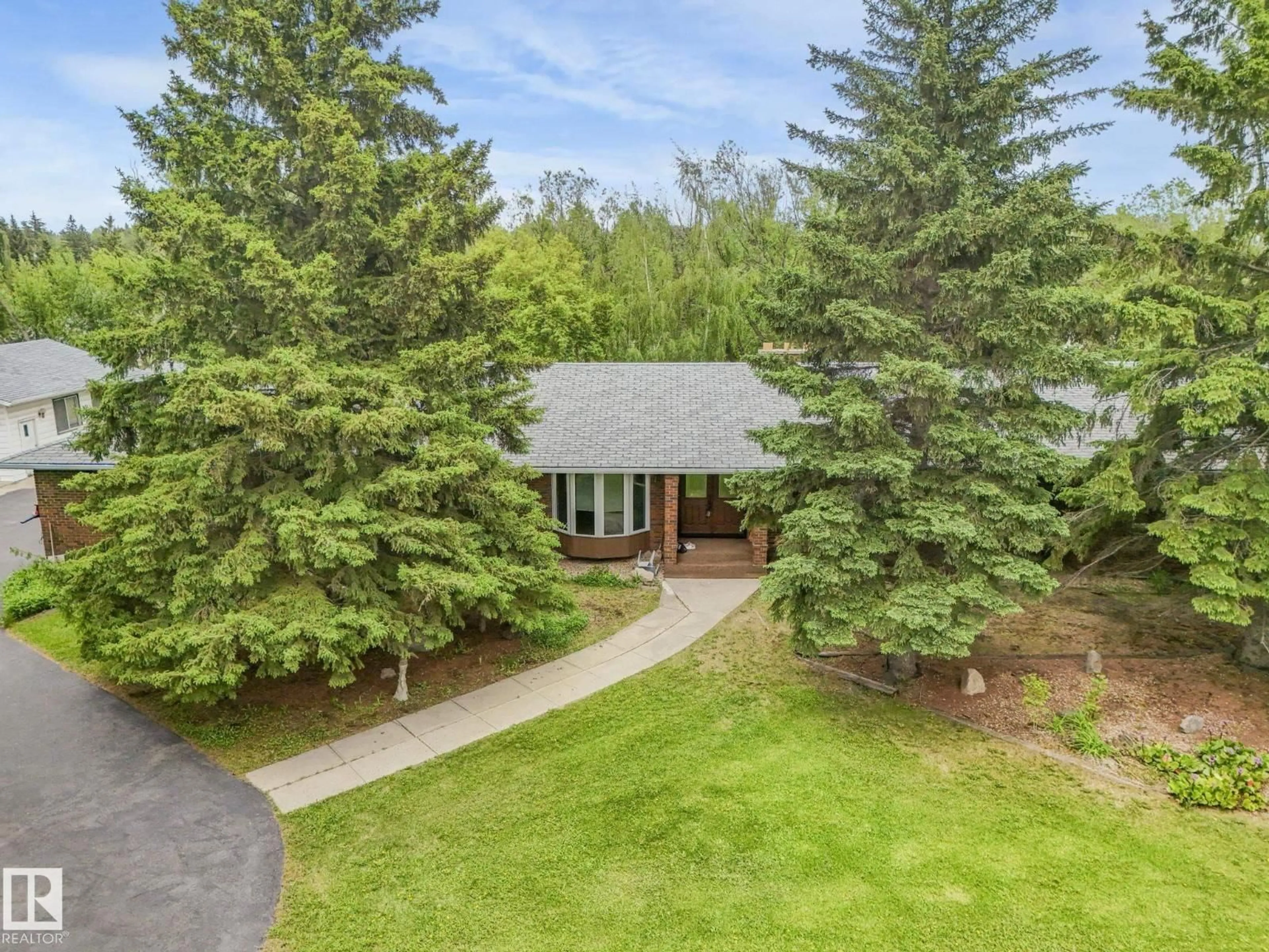 A pic from outside/outdoor area/front of a property/back of a property/a pic from drone, mountain view for 11921 231 ST, Edmonton Alberta T5S2C2