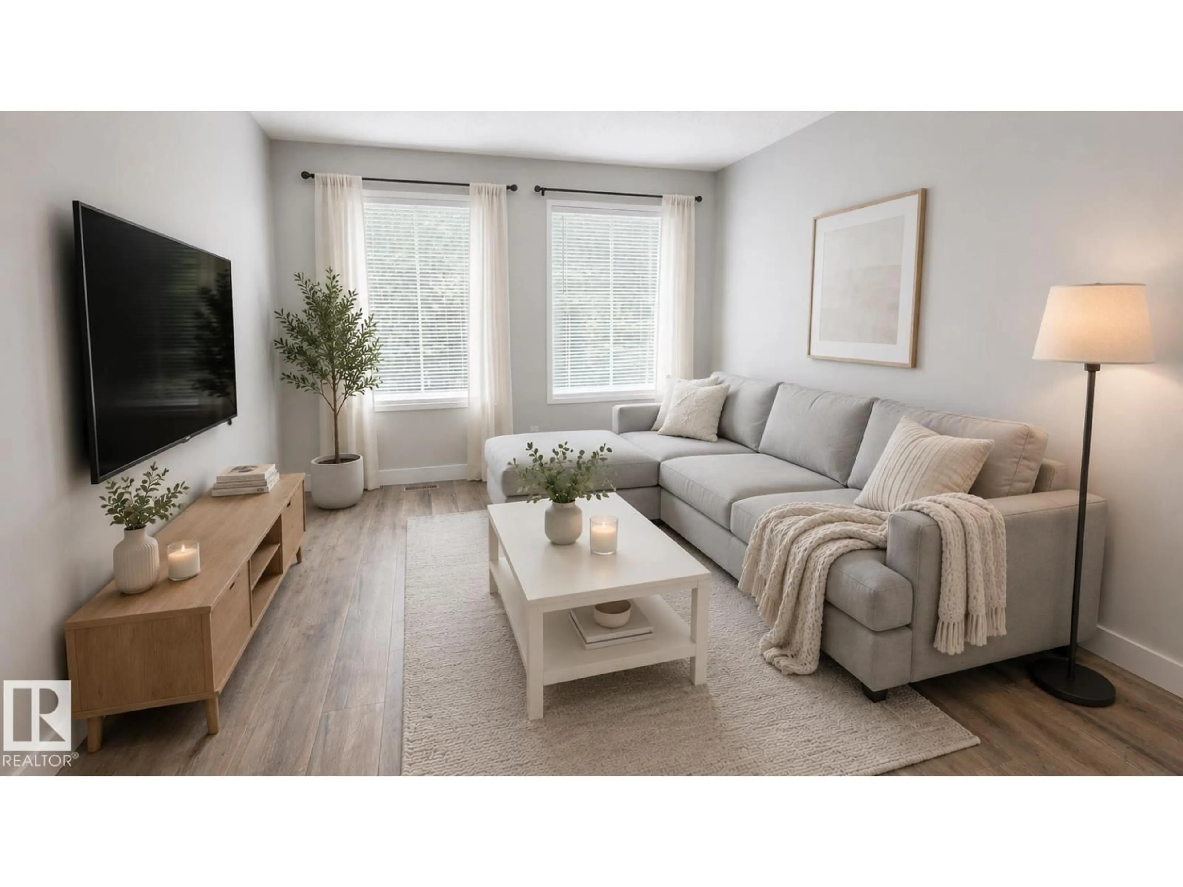 Living room with furniture, wood/laminate floor for 4301/4303 44 ST, Beaumont Alberta T4X1G2