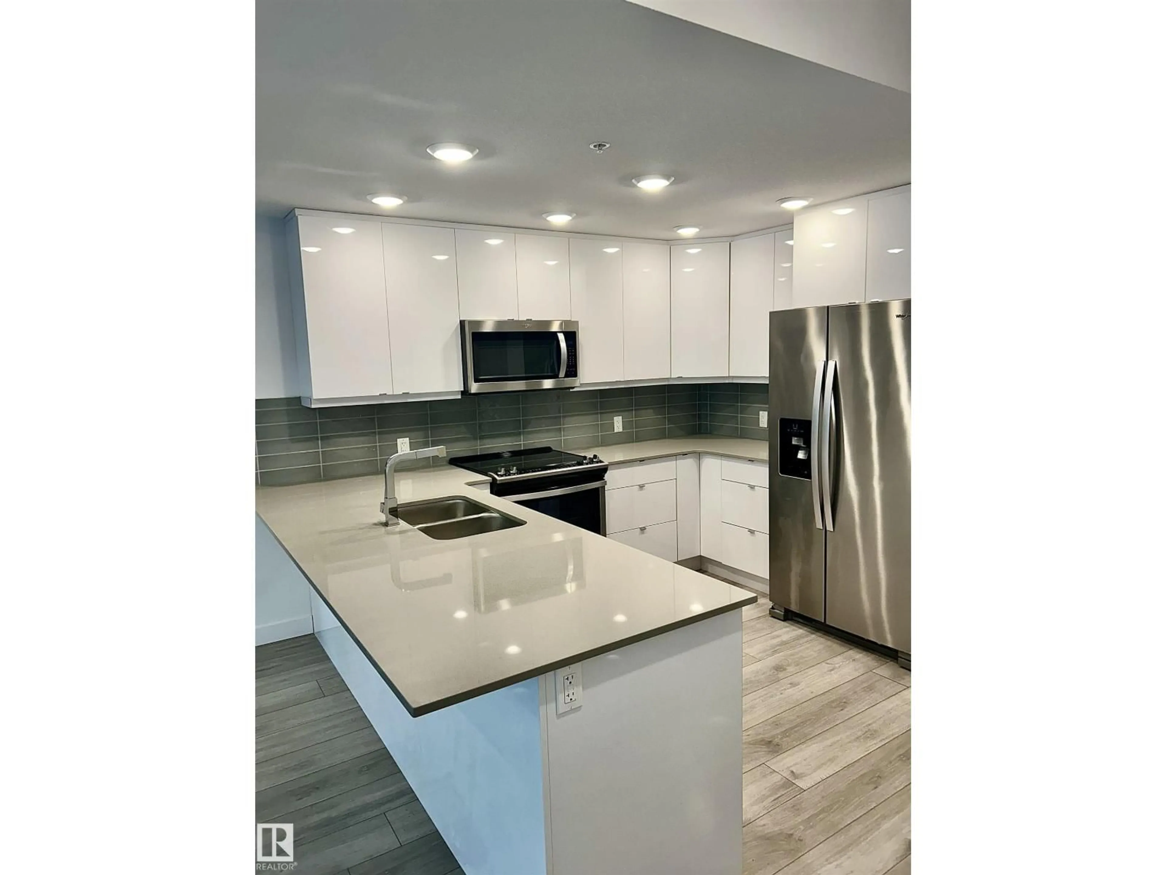 Open concept kitchen, ceramic/tile floor for #203 - 8510 90 ST, Edmonton Alberta T6C3L5