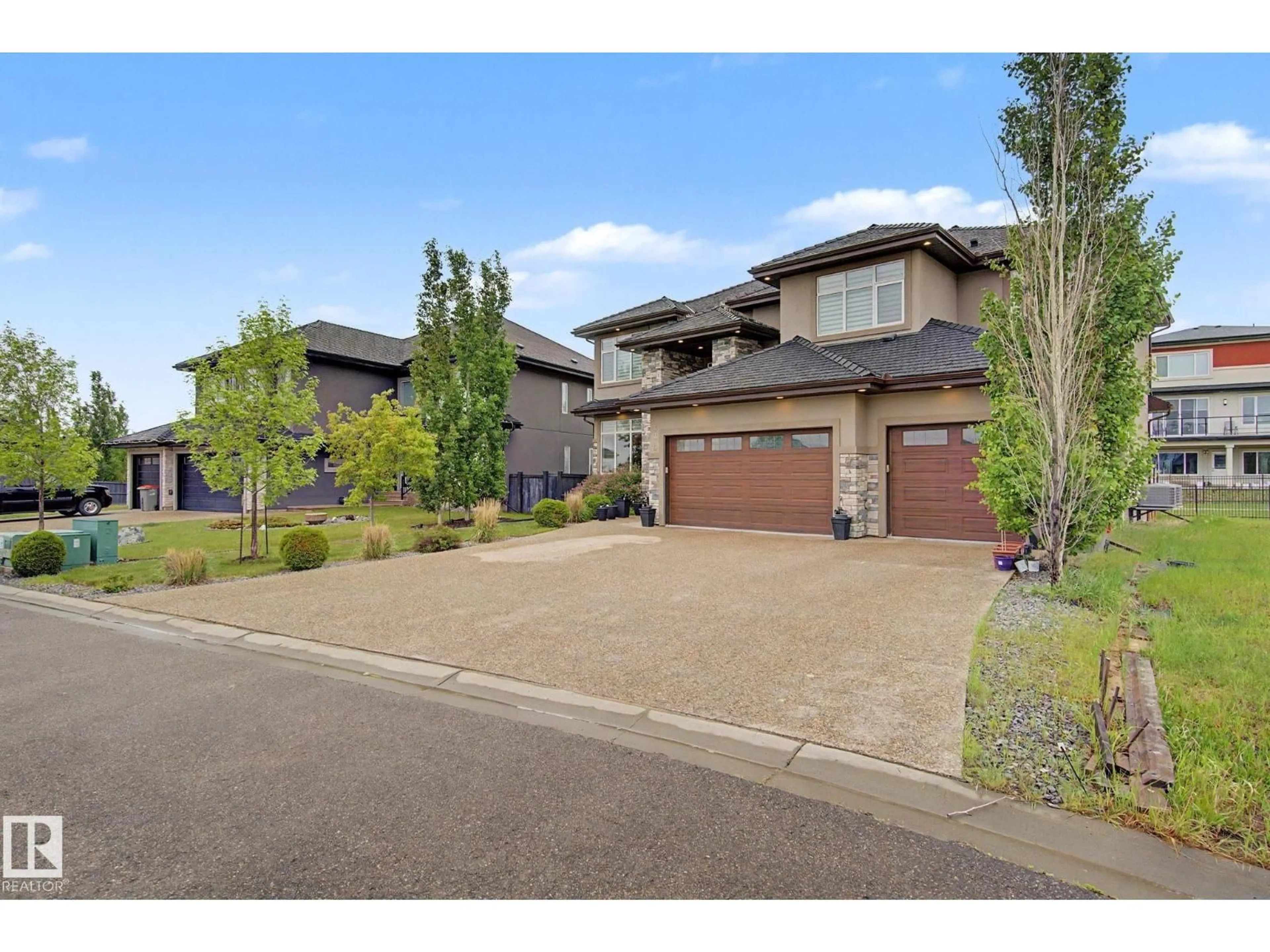 Home with brick exterior material, street for NE - 3036 59 AV, Rural Leduc County Alberta T4X0X9