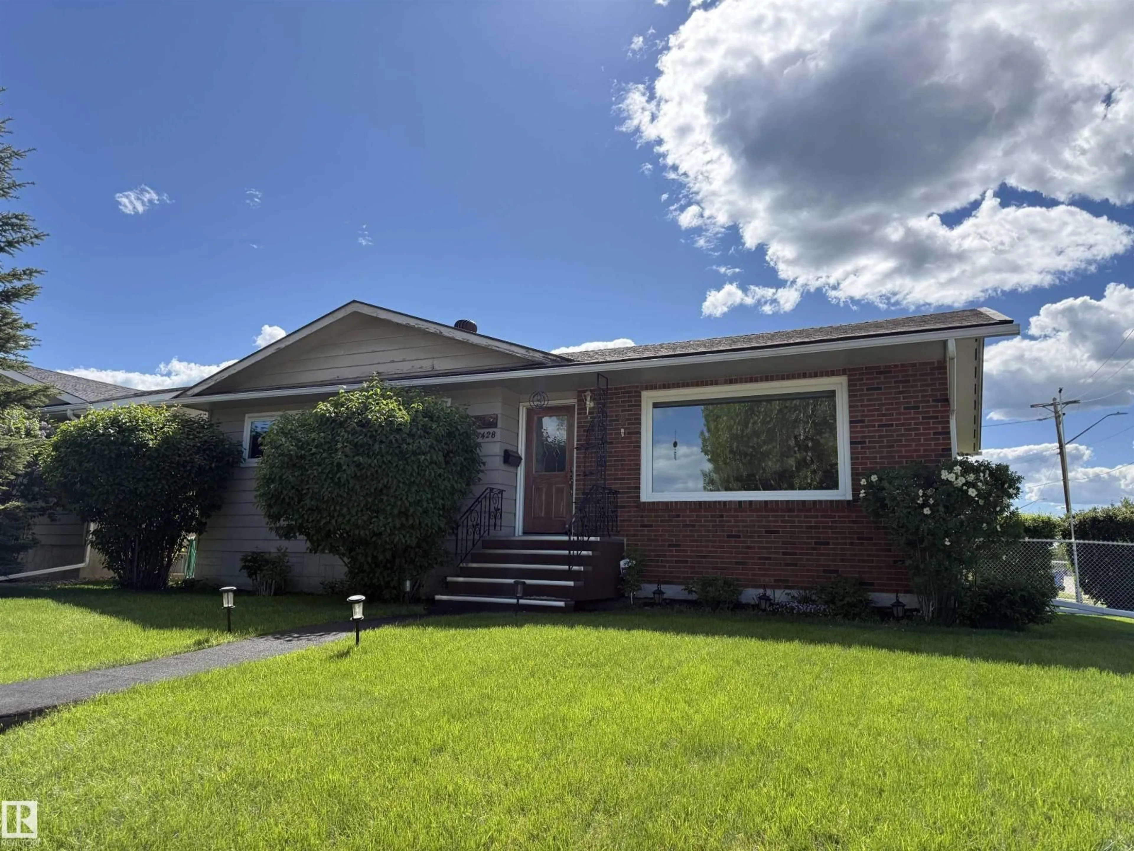 Home with brick exterior material, street for 5428 49A ST, Drayton Valley Alberta T7A1A3